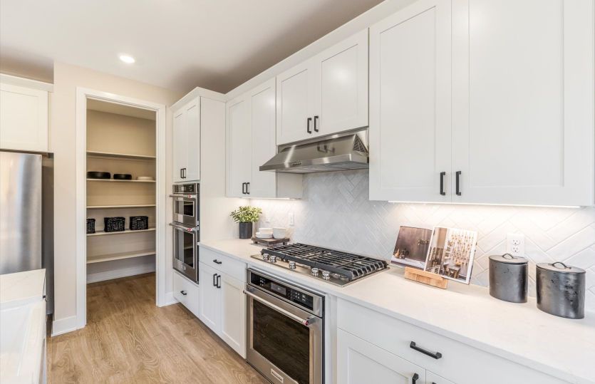Designer finishes with a walk-in pantry