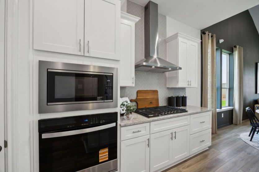 Bright and Open Kitchen with Built In Appliances