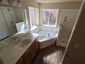 casa en Radiant Blue Construction por Radiant Blue Construction