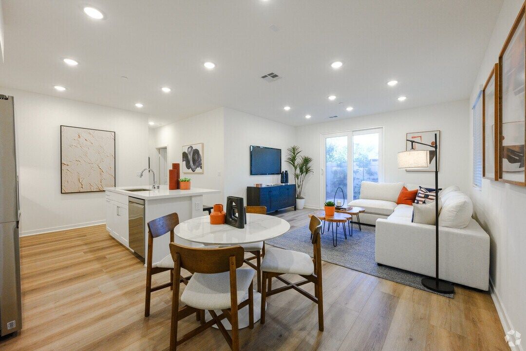 Spacious great room connecting kitchen, dining, and living area