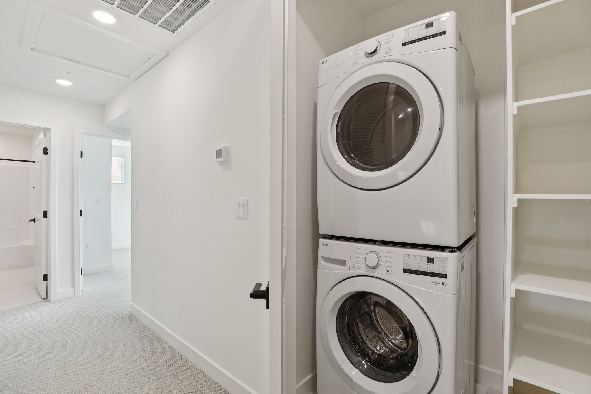 Laundry closet with washer and electric dryer included