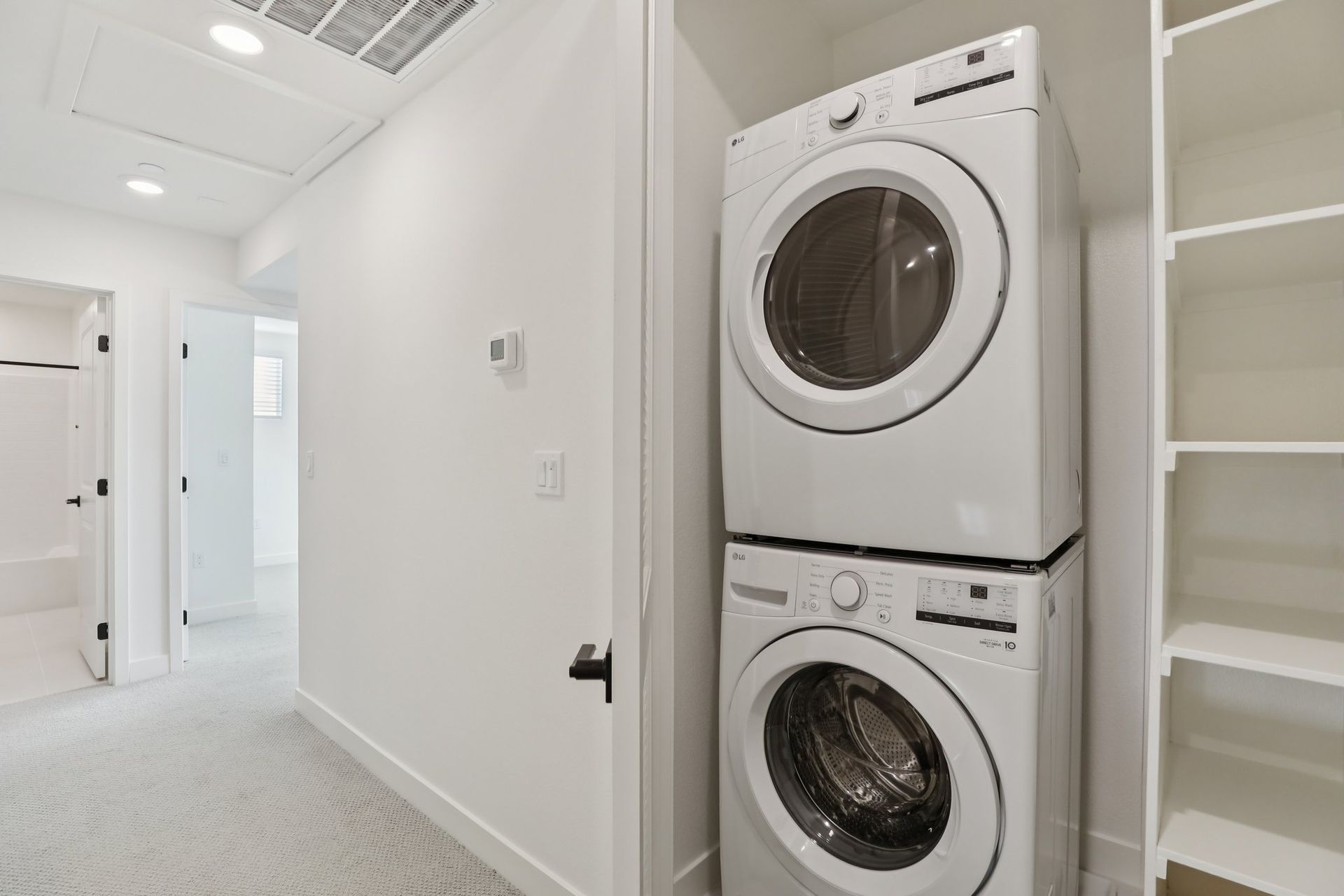 Laundry closet with washer and electric dryer included