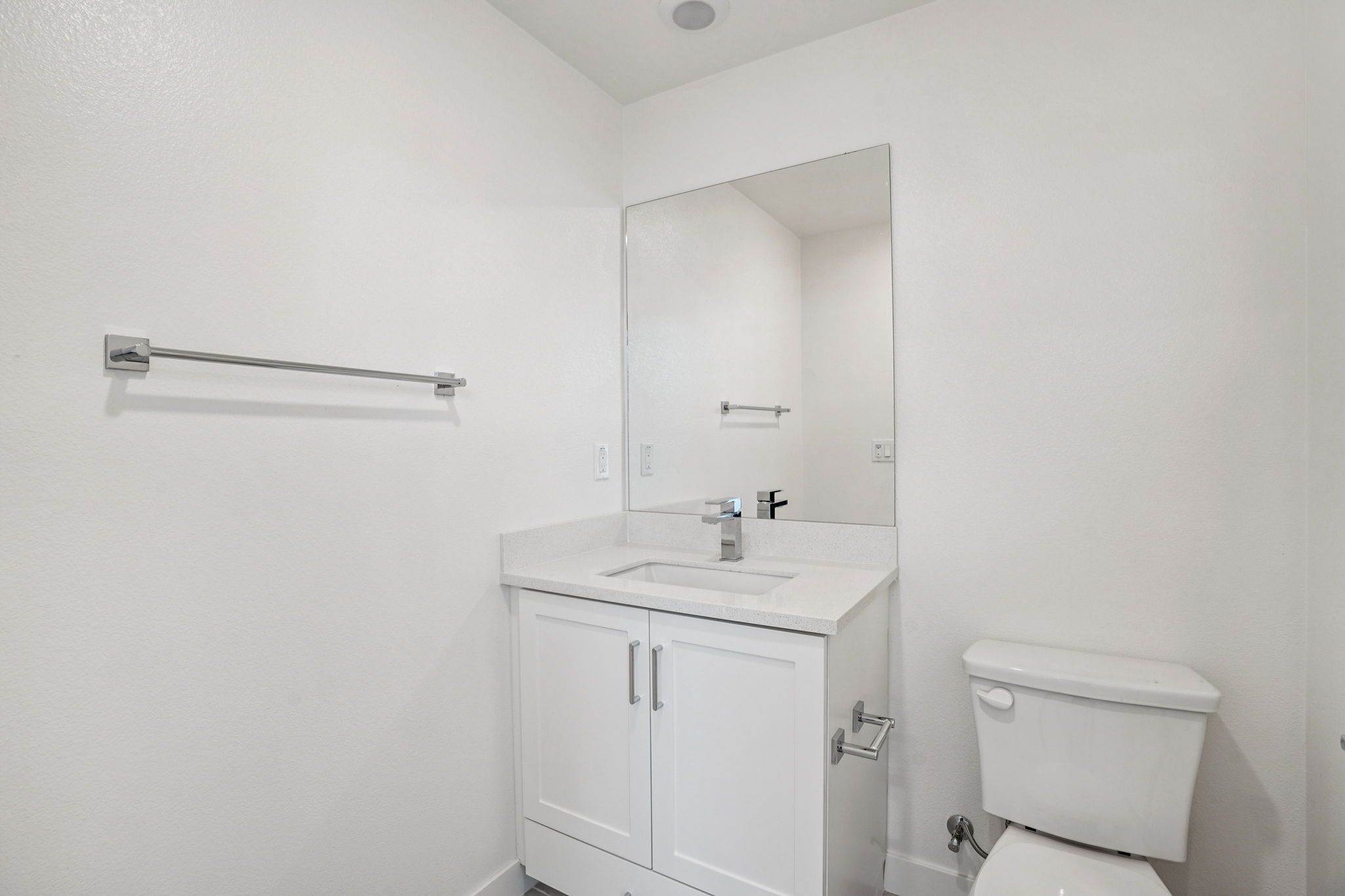 Convenient first-floor full bathroom with vanity and shower.