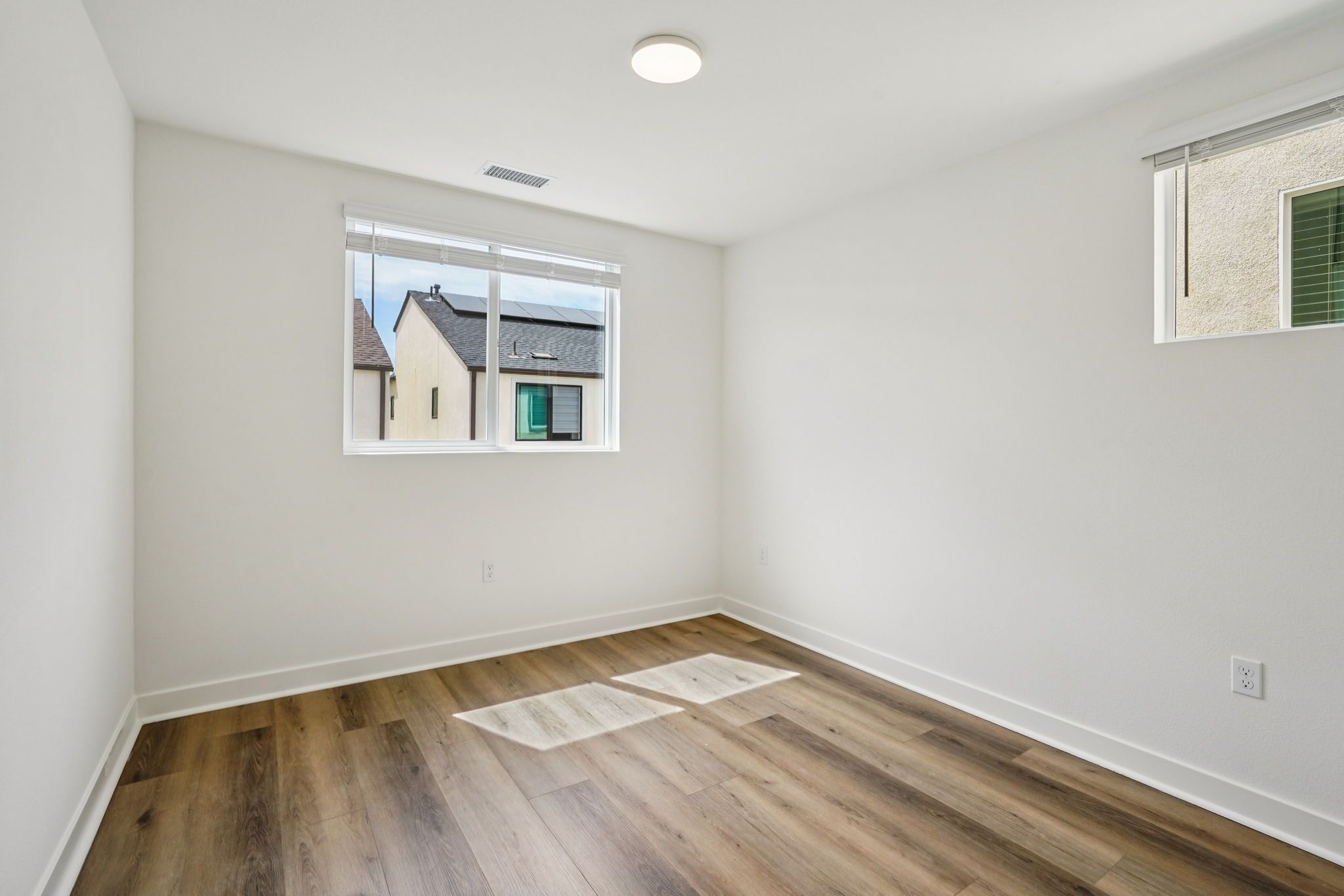 Well-proportioned secondary bedroom 3 with a large window and balanced design