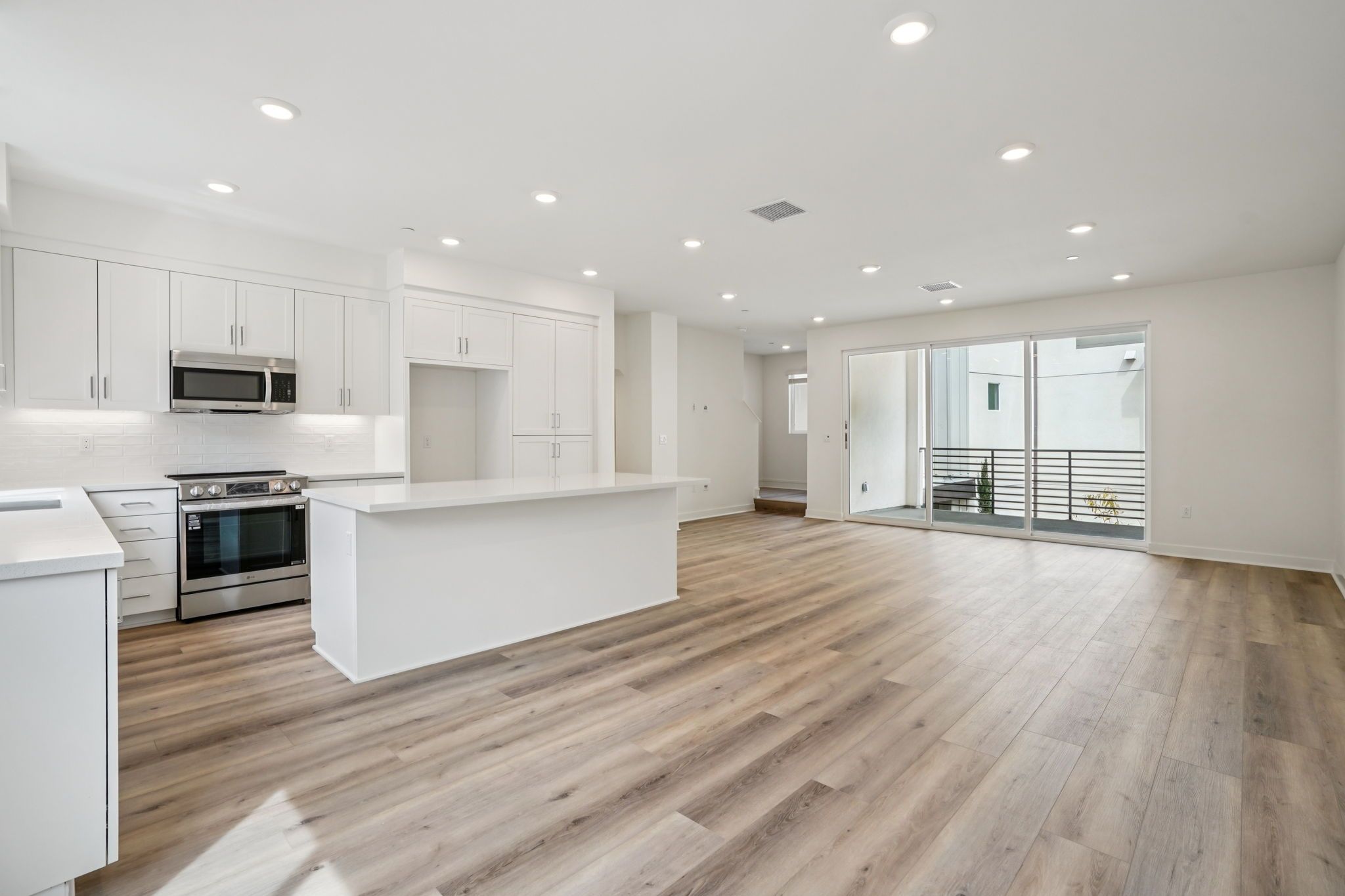 Great room encompassing living, dining, and kitchen areas