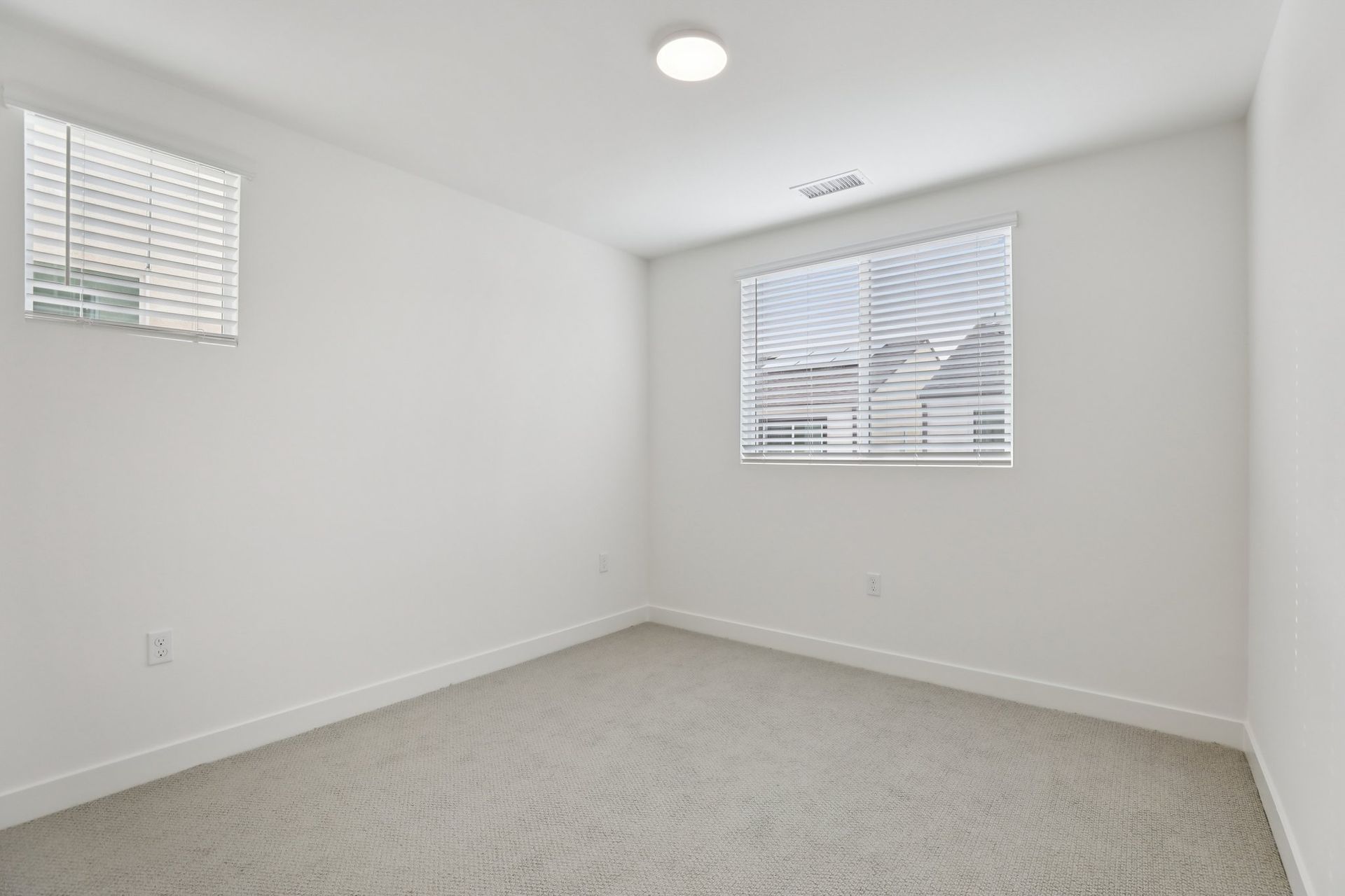 Well-proportioned secondary bedroom 3 with a large window and balanced design