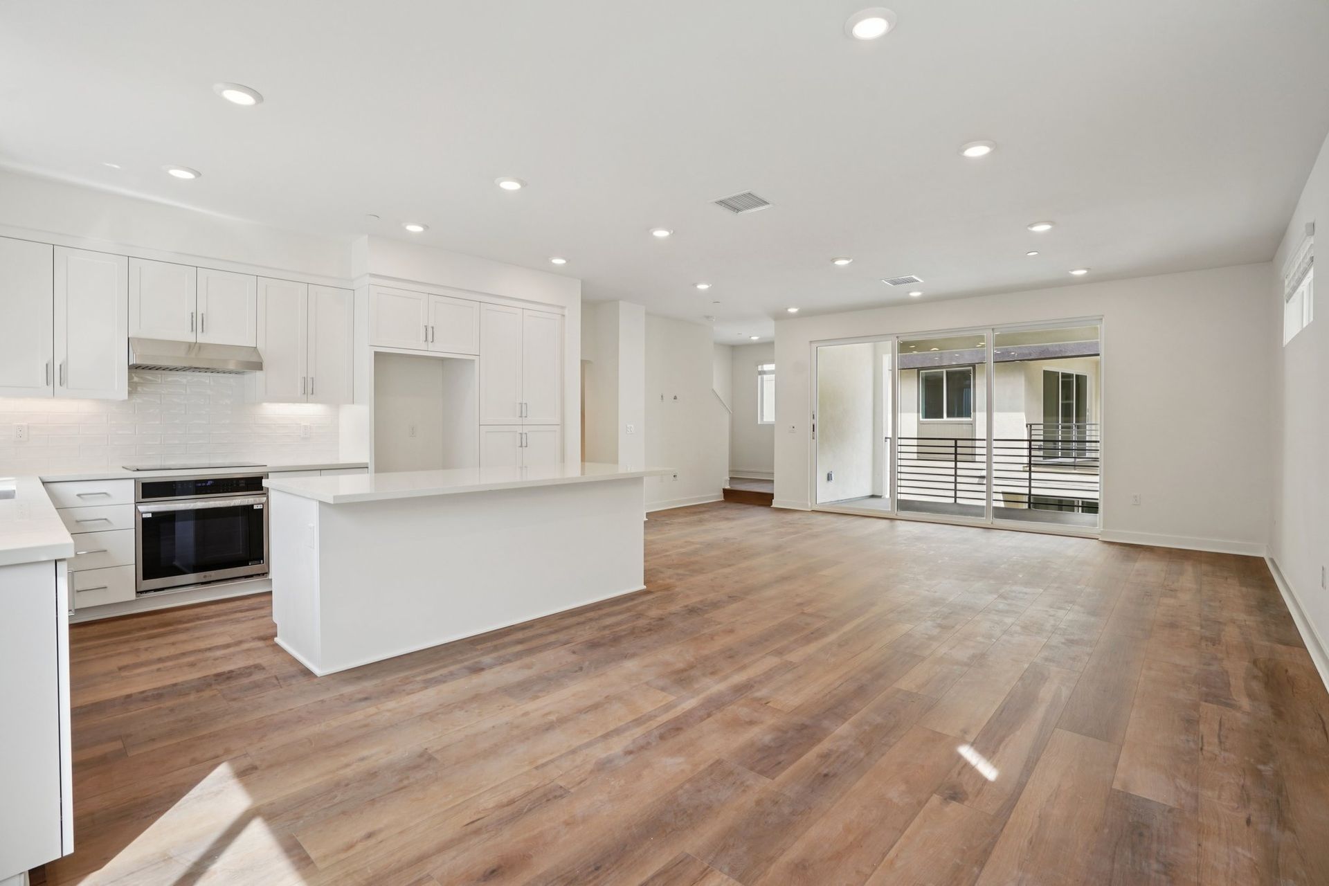 Great room encompassing living, dining, and kitchen areas
