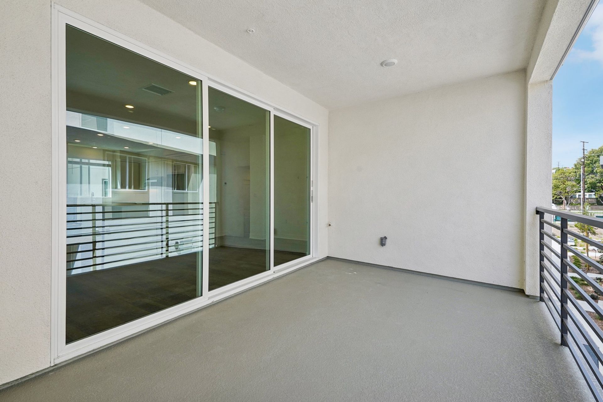 Spacious deck with 3 panel multi-sliding glass doors