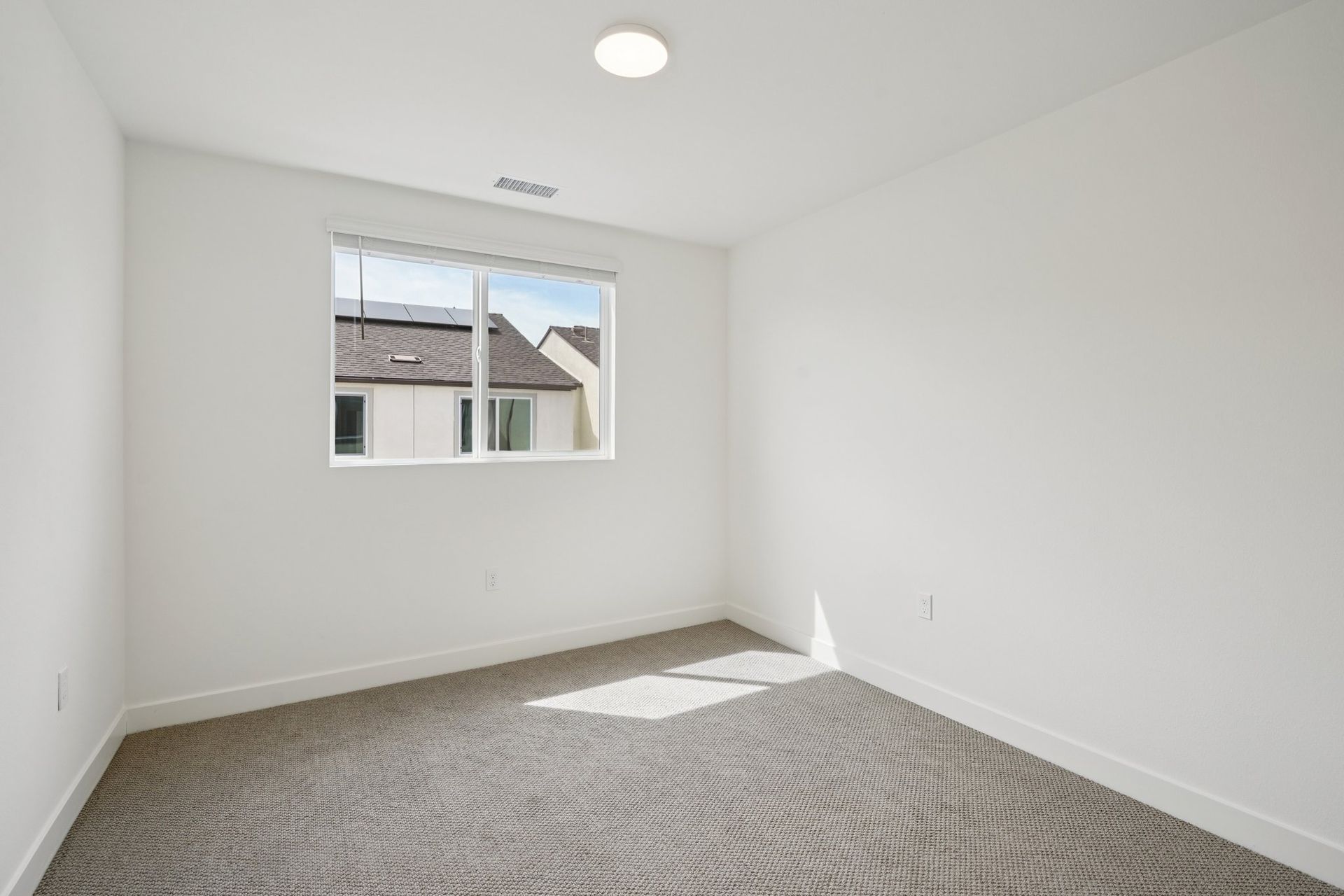 Well-proportioned secondary bedroom 3 with a large window and balanced design