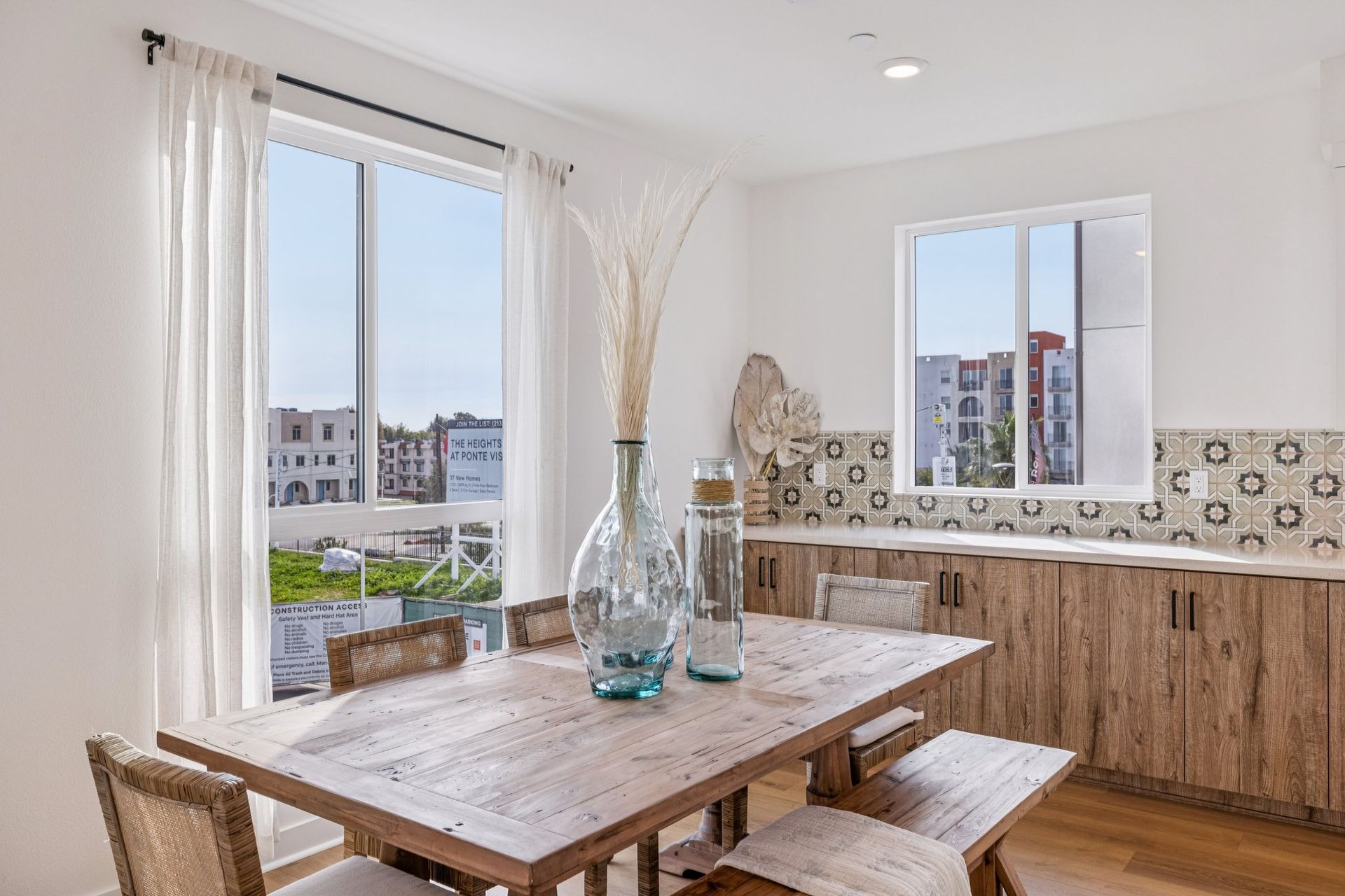 Model home dining area with natural light