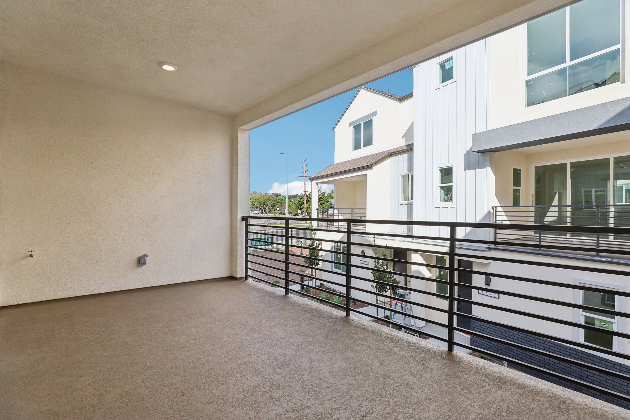 Spacious deck with 3 panel multi-sliding glass doors