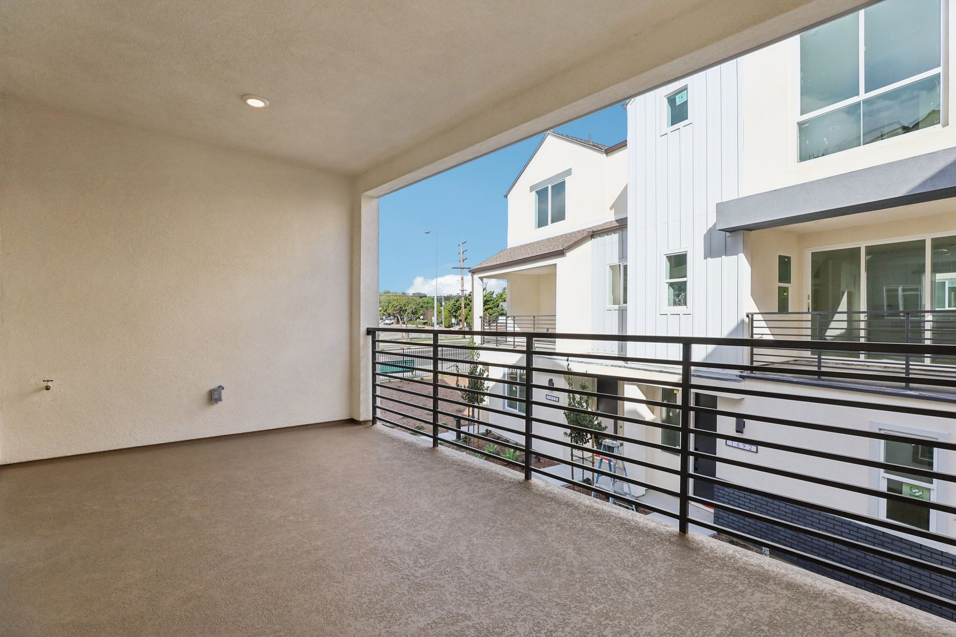 Spacious deck with 3 panel multi-sliding glass doors
