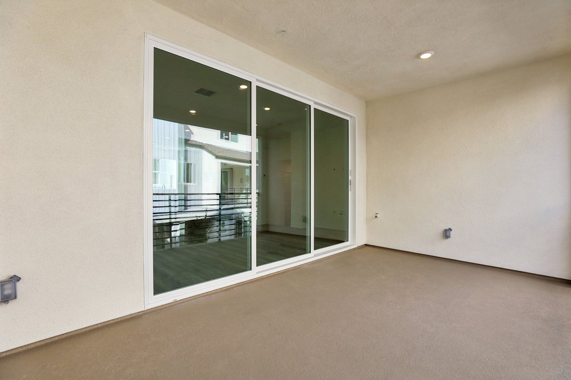 Spacious deck with 3 panel multi-sliding glass doors