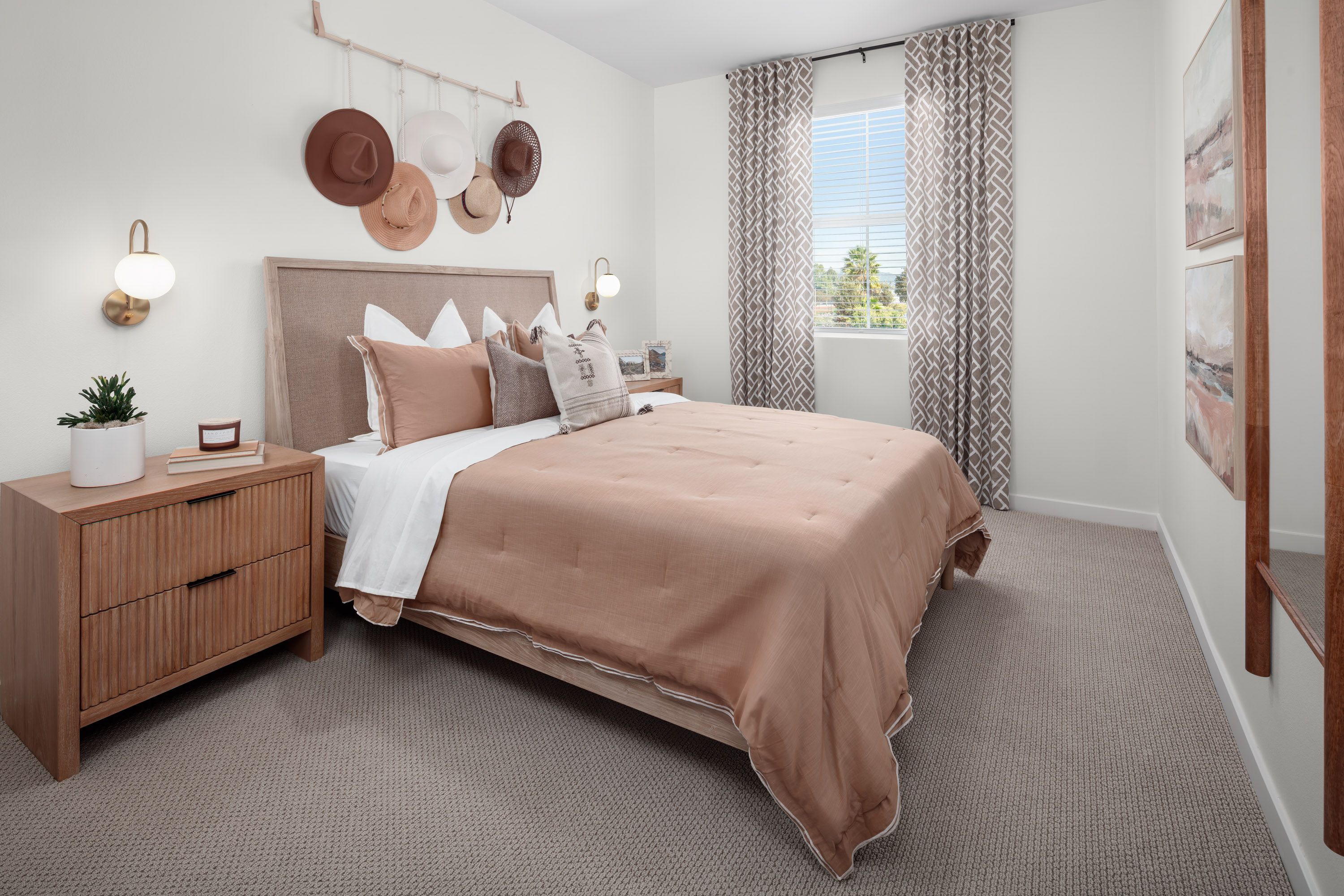 Plan 1 model home secondary bedroom 3 with a stylish design and natural light from window.