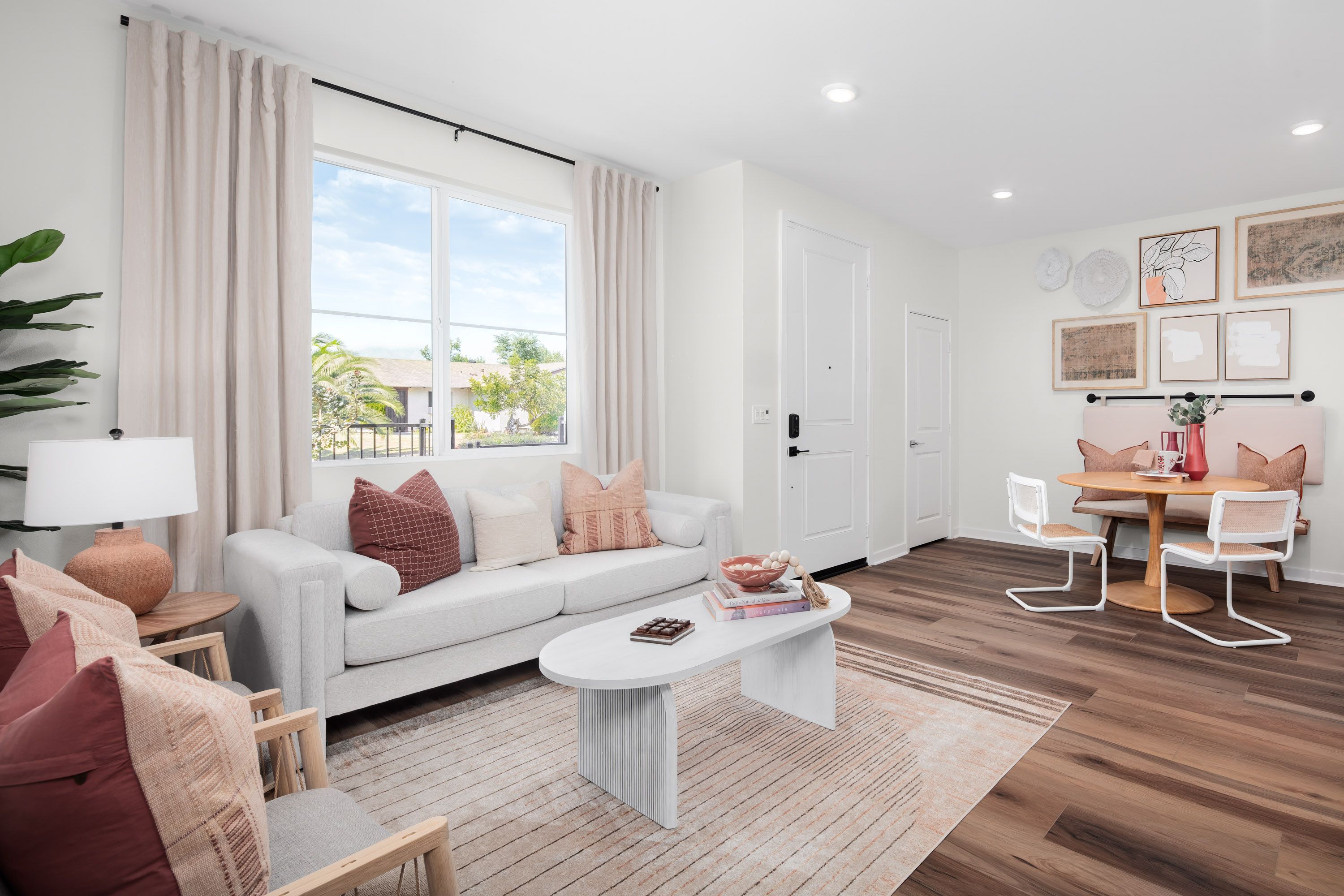 Plan 1 model home living and dining area with natural light