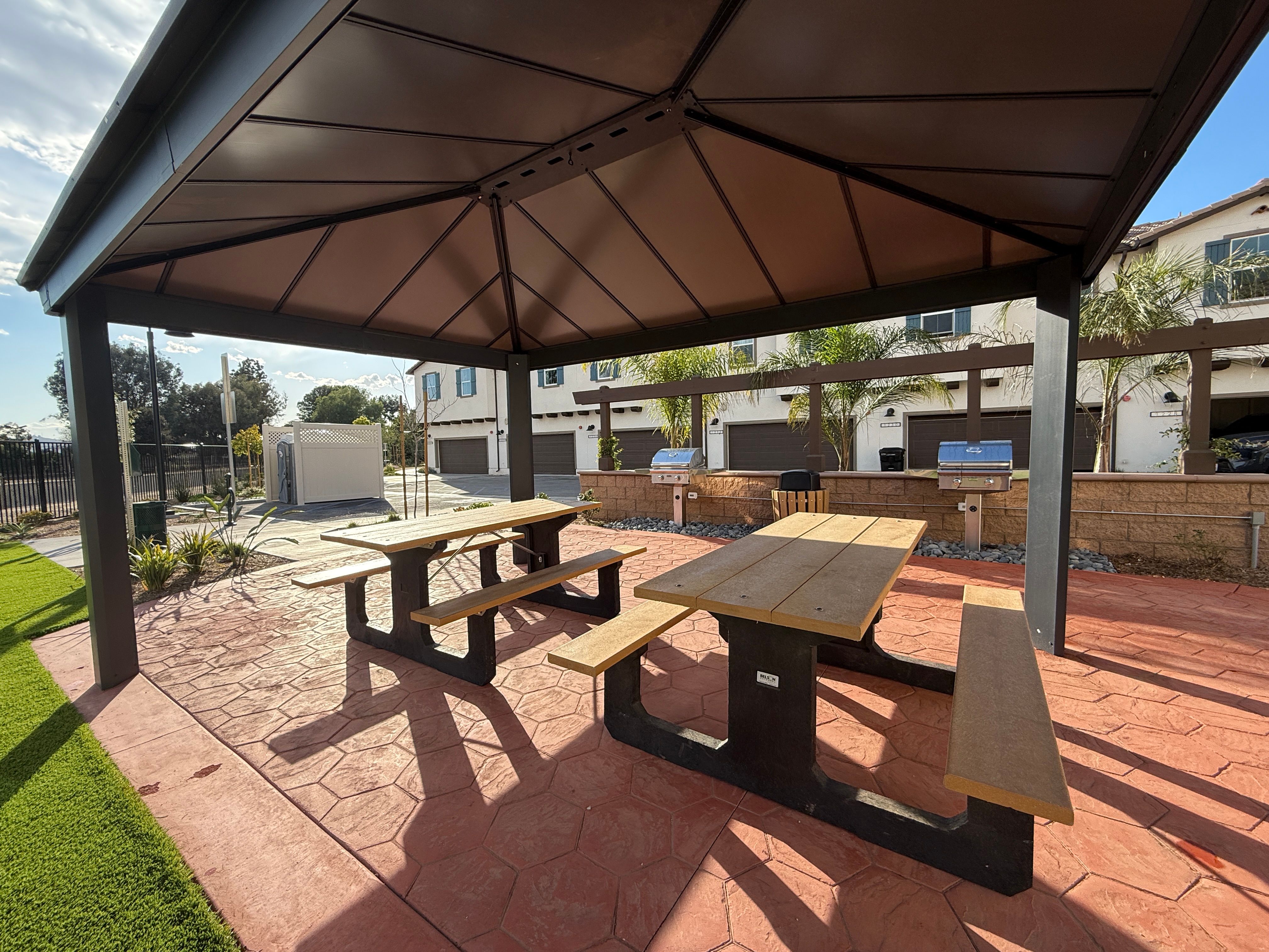 Covered picnic area with two tables