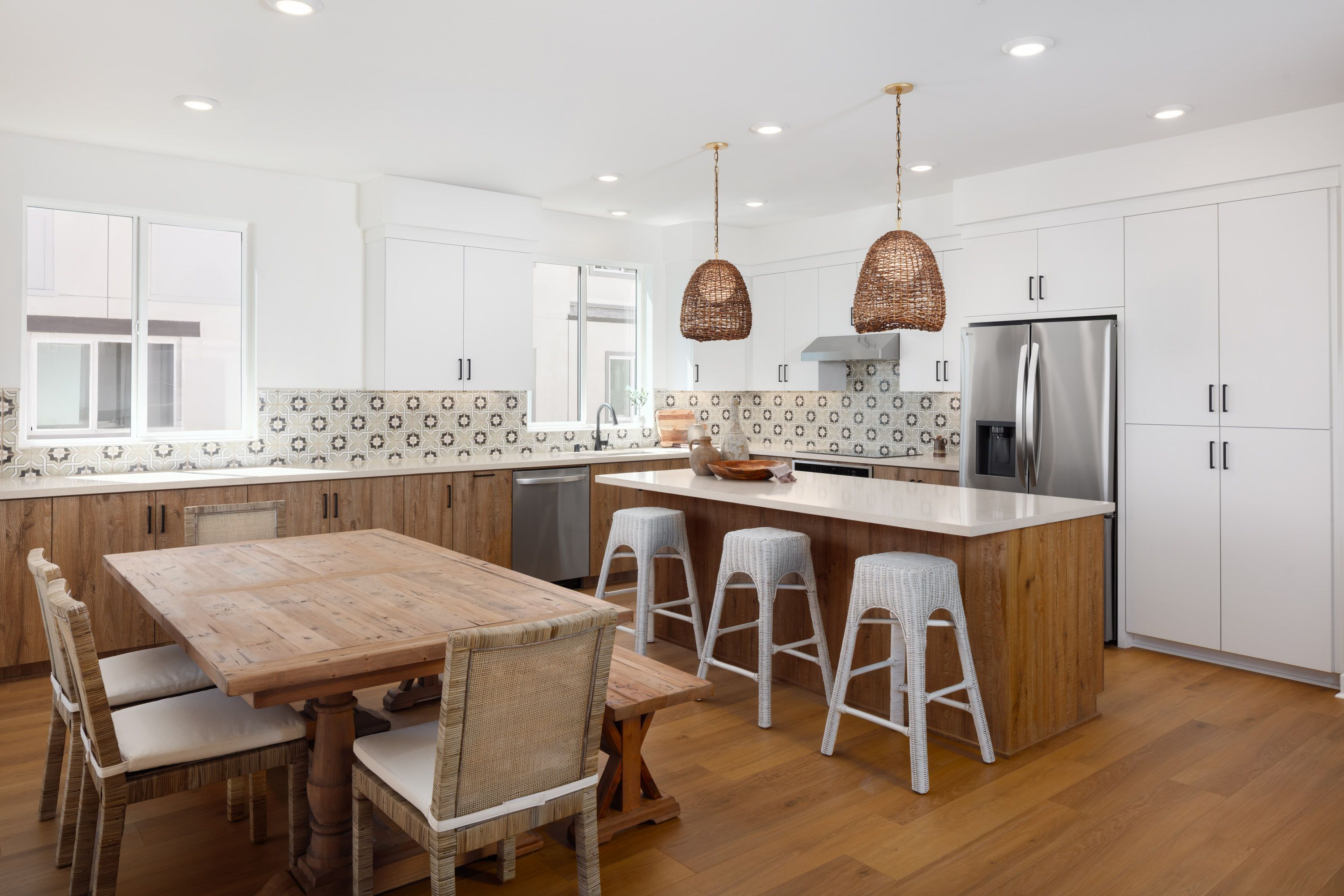 Model home inviting kitchen and dining space designed for connection and everyday ease