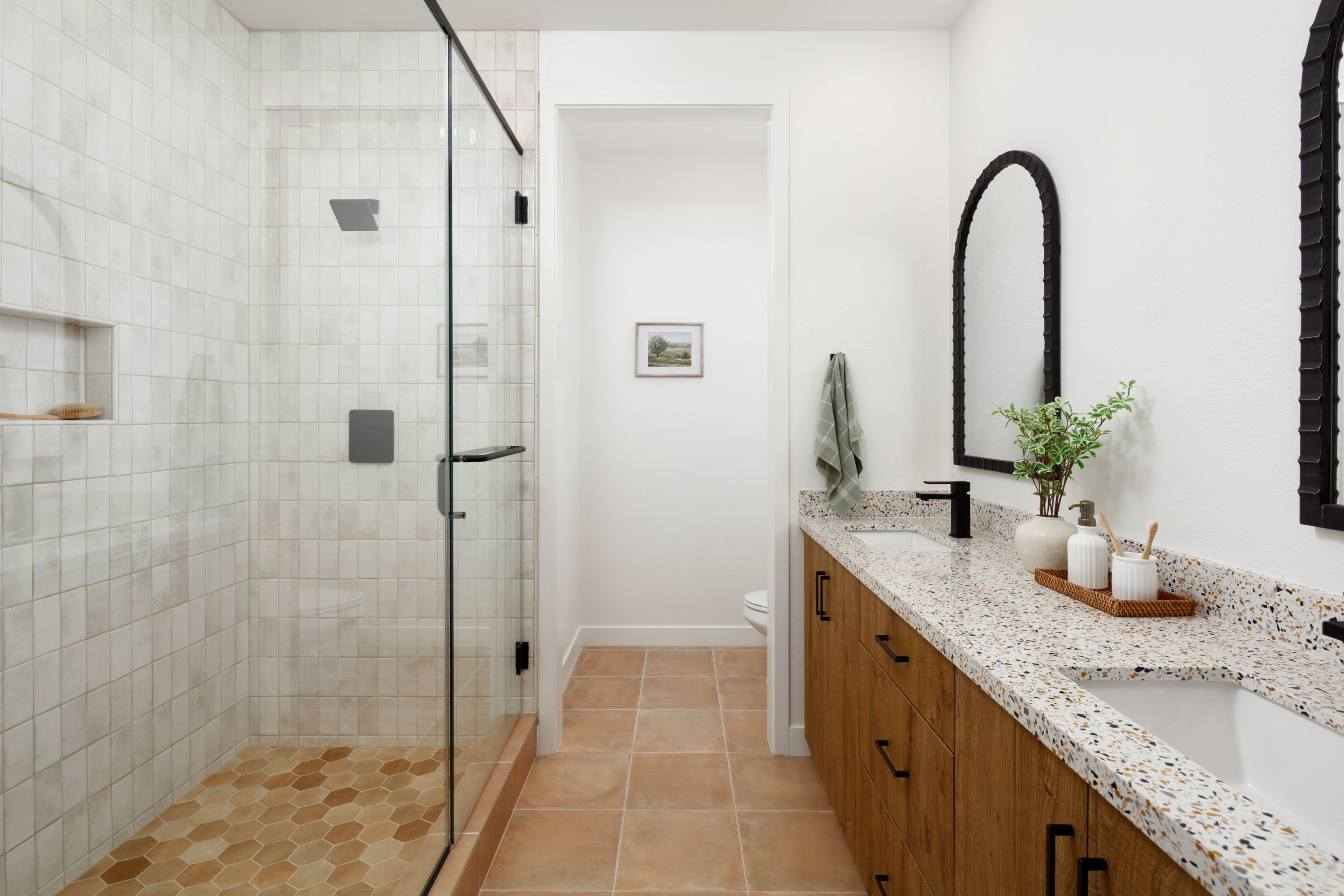 Model home primary bathroom featuring elegant designer details
