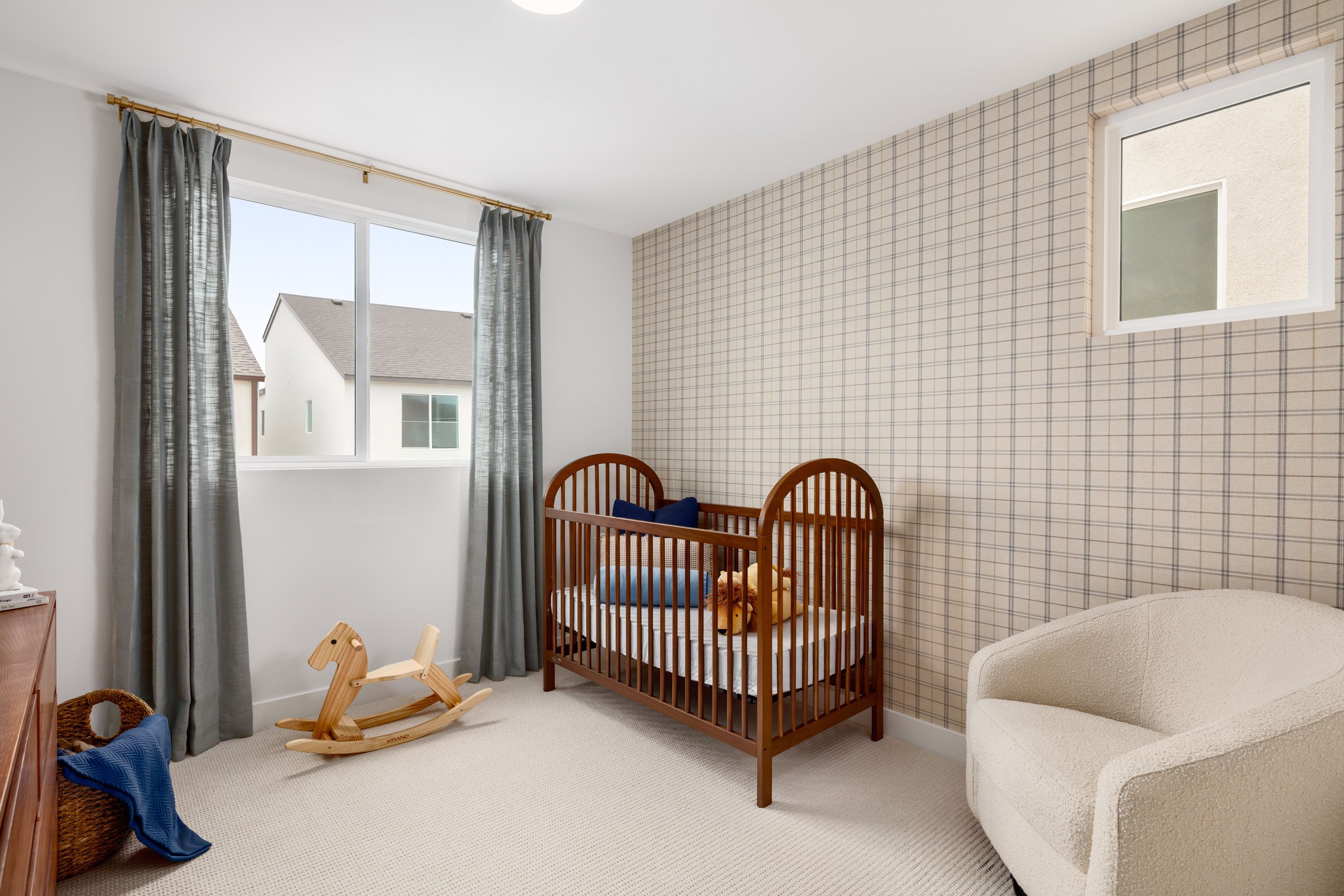 Model home well-proportioned secondary bedroom 3 with a large window and balanced design