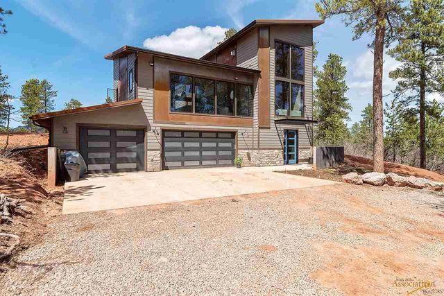 casa en The Timbers por Rae Marie Homes