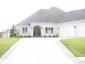 casa en Renowned Builders, Inc. por Renowned Builders, Inc.