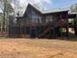 casa en Rogers Equipment & Construction por Rogers Equipment & Construction