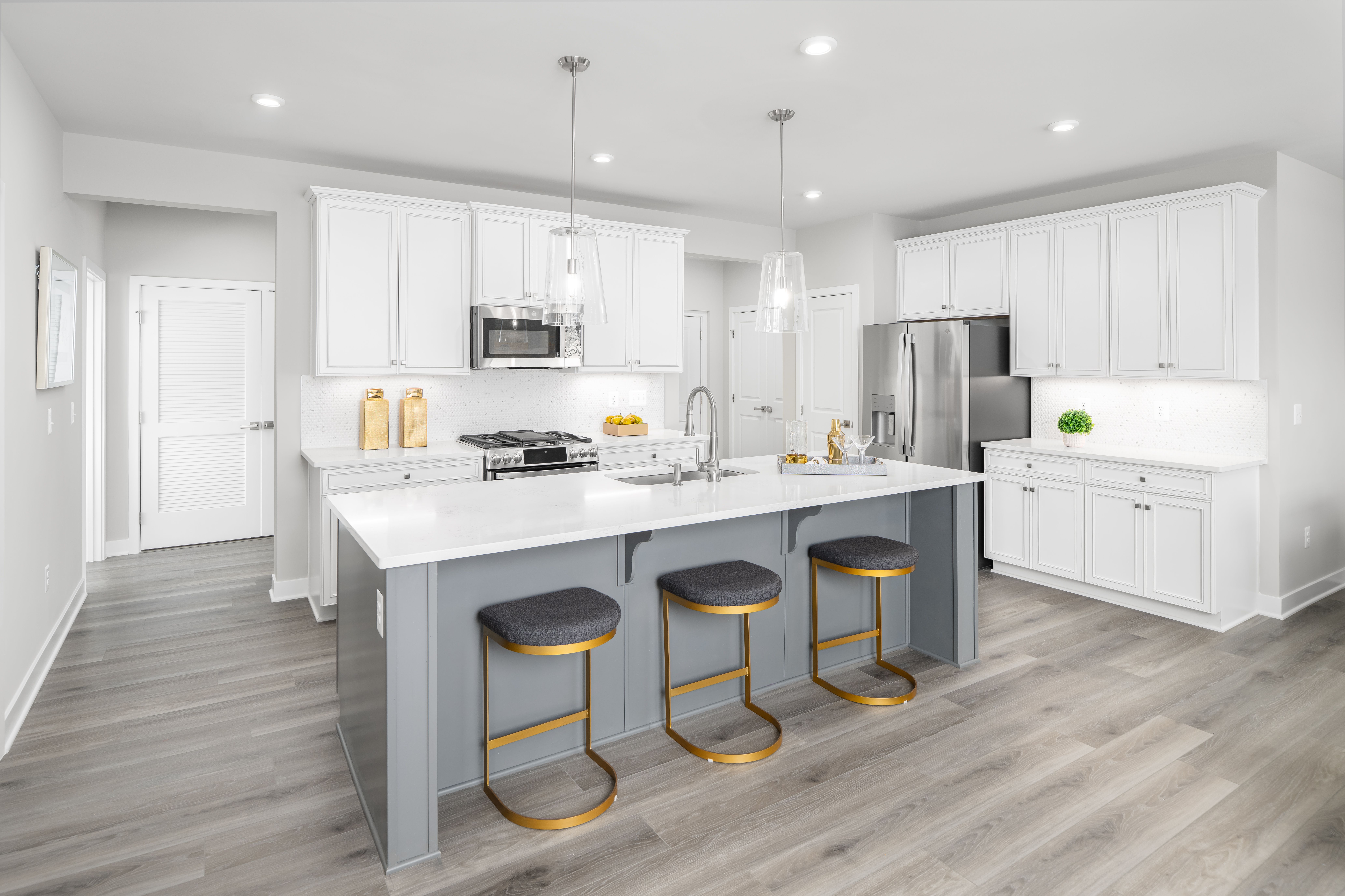 casa en Potomac Shores Elevator Condos por Ryan Homes