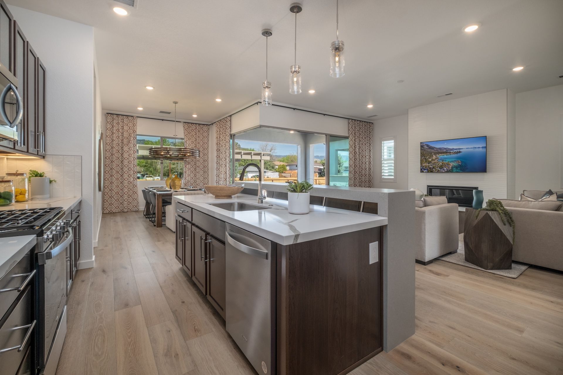 Our Plan 2's Kitchen, Dining Area & Great Room With A Corner Slider For Seamless Indoor/Outdoor Liv