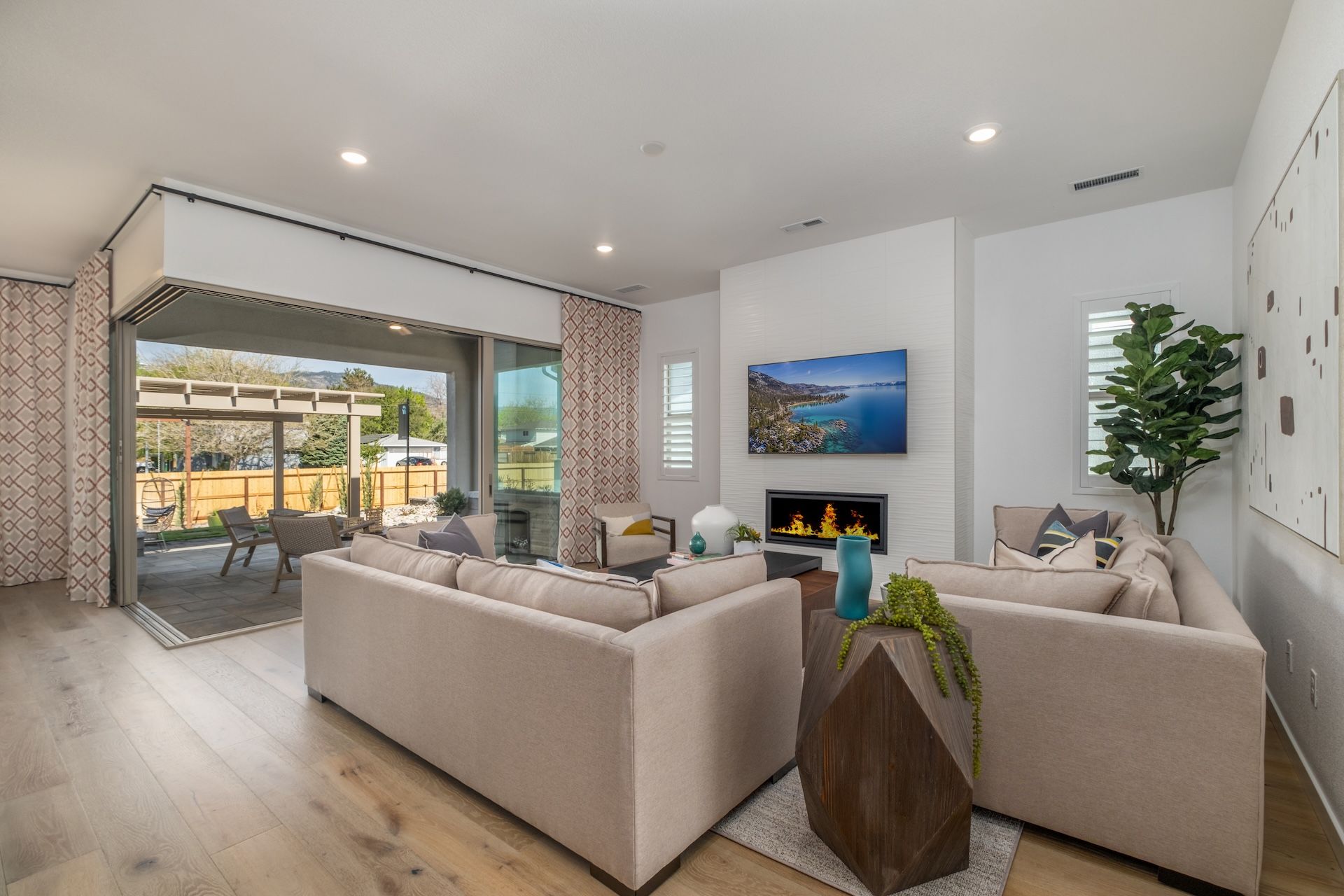 Plan 2's Great Room With A Multi-Panel Corner Slider & Linear Style Fireplace