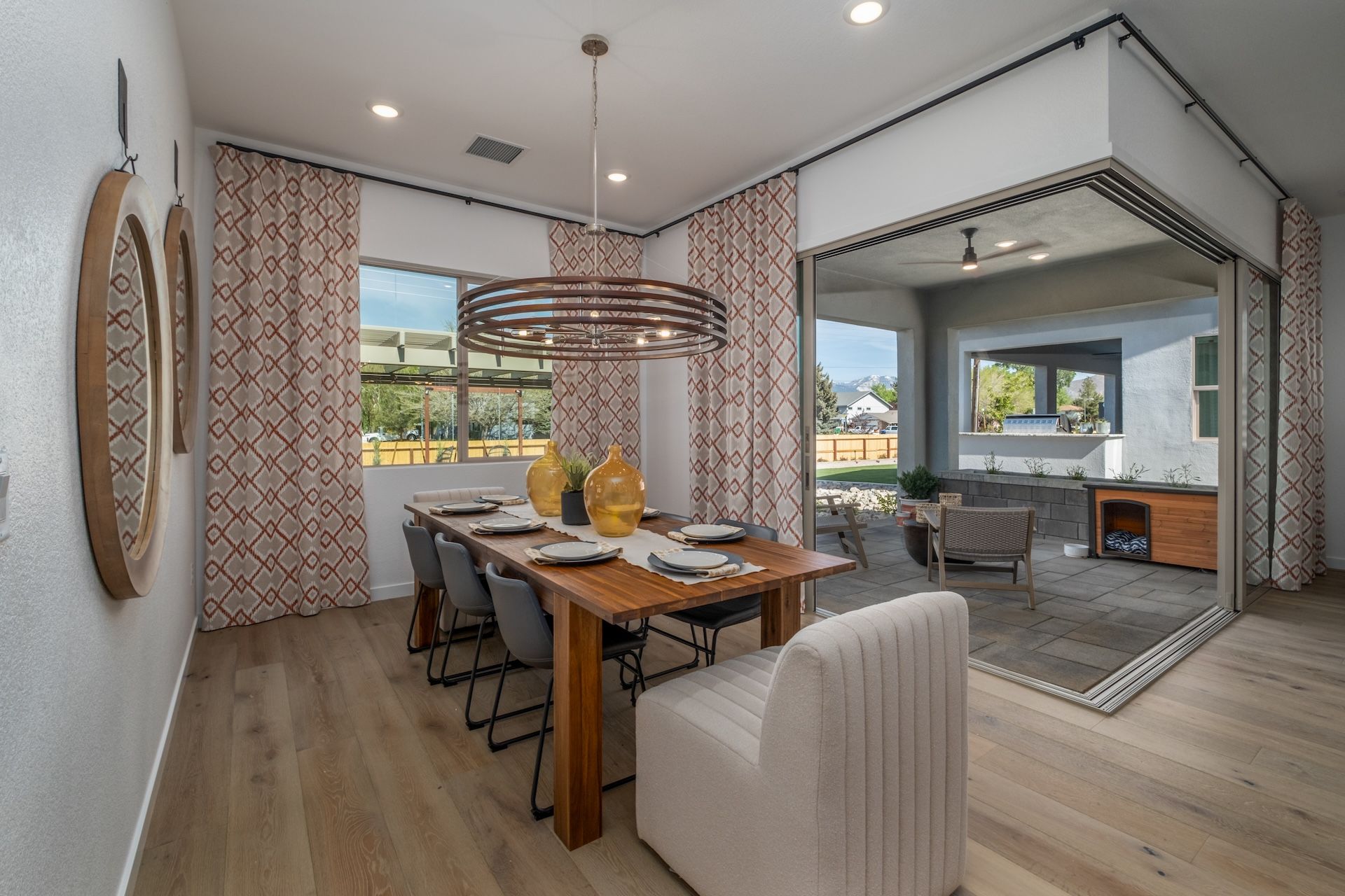 The Plan 2 Model Showcasing The Dining Area With A Multi-Panel Corner Slider