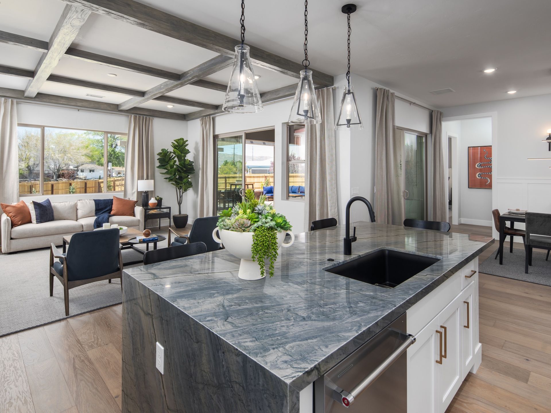 Plan 3 Kitchen Island & View Of Great Room To A Covered Loggia