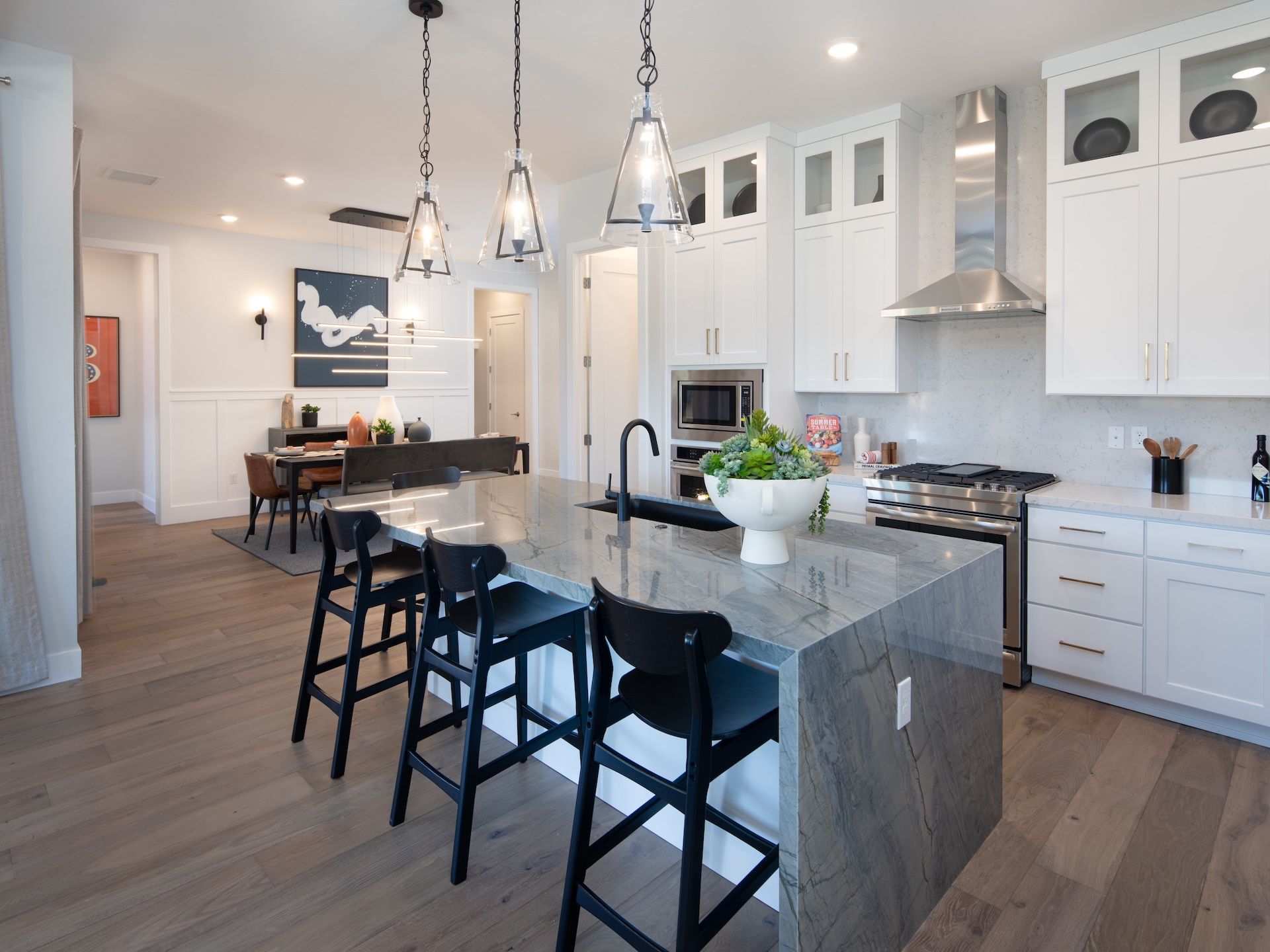 Plan 3's Kitchen & Dining Area Featuring A Waterfall Island With Undermount Sink