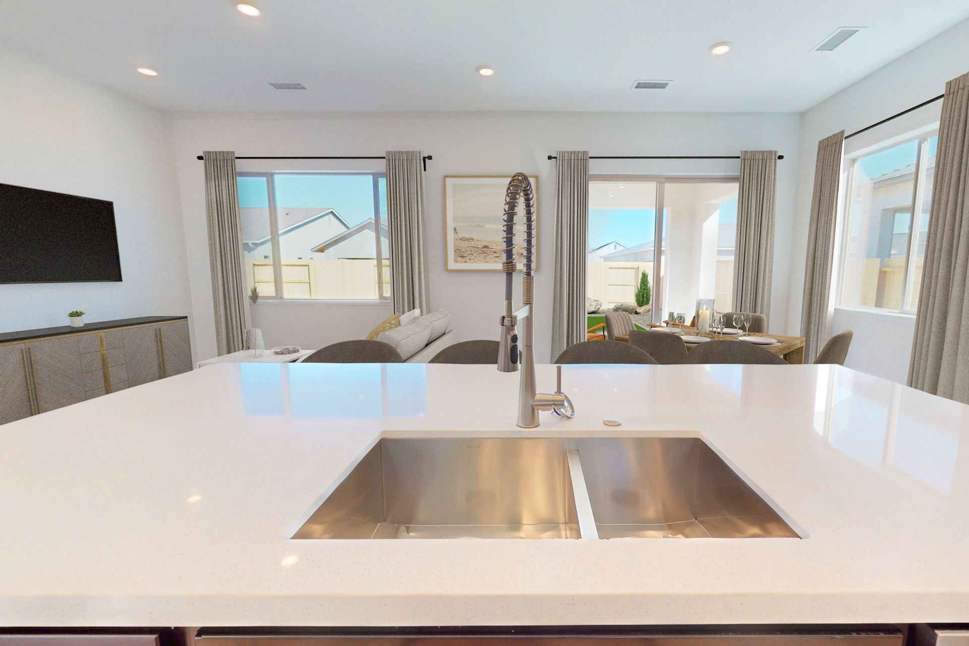 View of Sink with Great Room and Dining Area