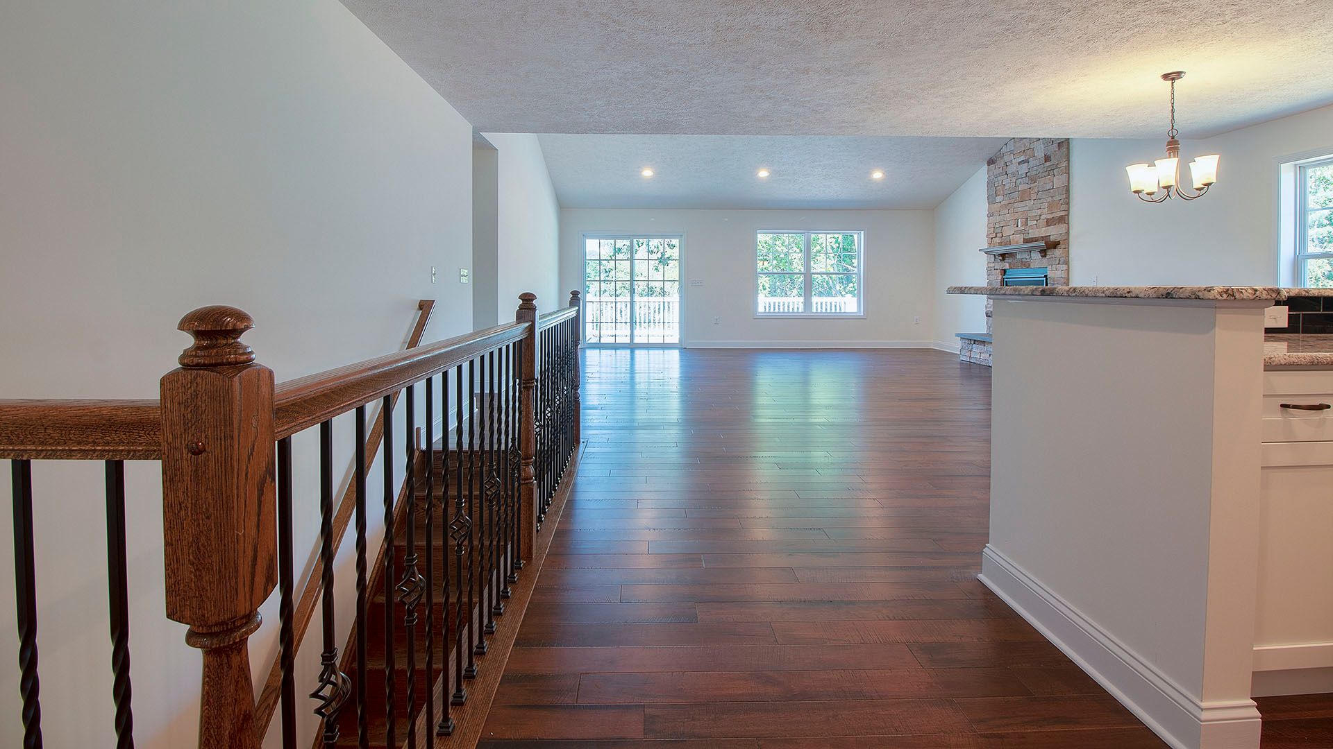 View into family room area with hardwood floors in Aspen floorplan