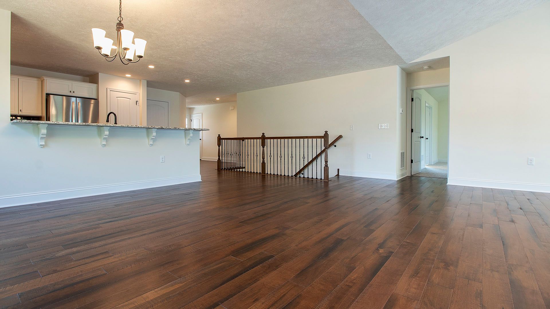 Family room with hardwood flooring
