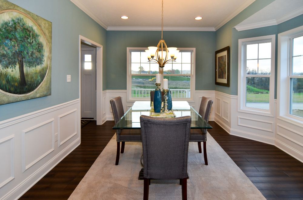 Furnished formal dining room with bay window, S&A Homes