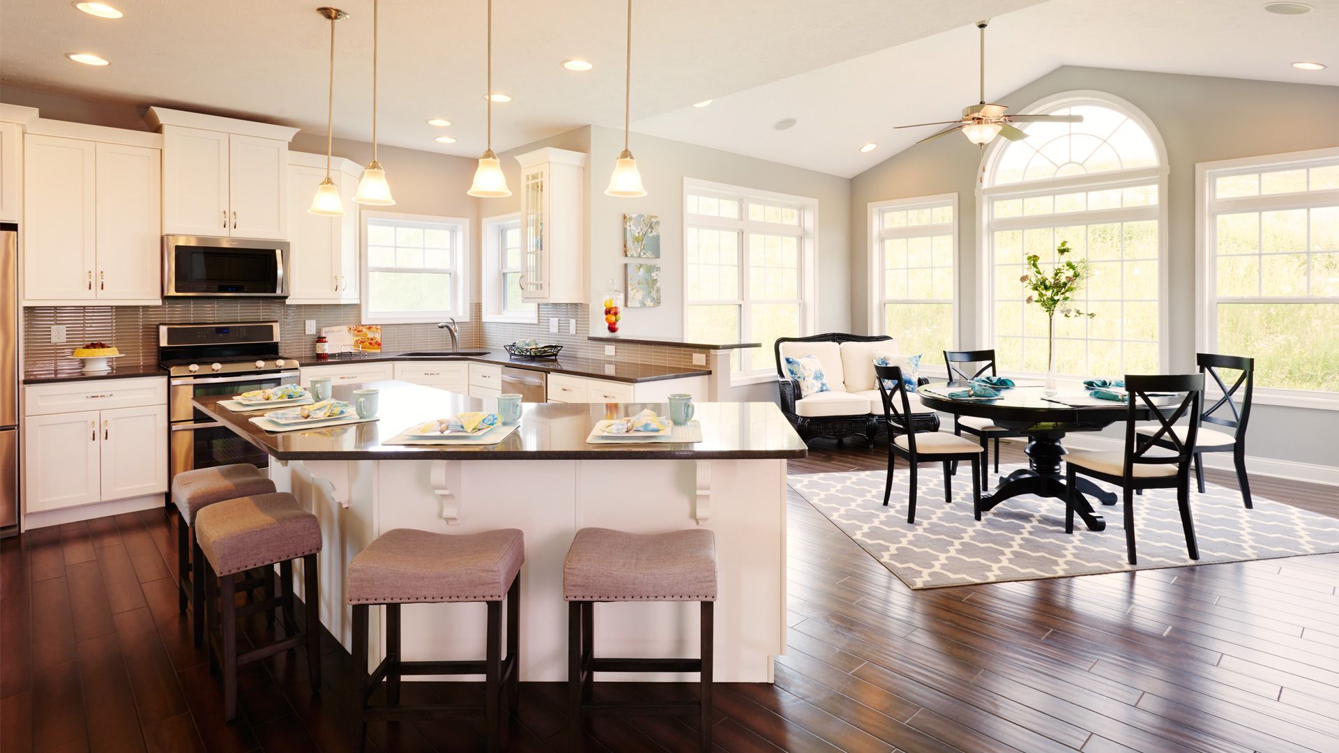 Kitchen with morning room extension with wall of windows