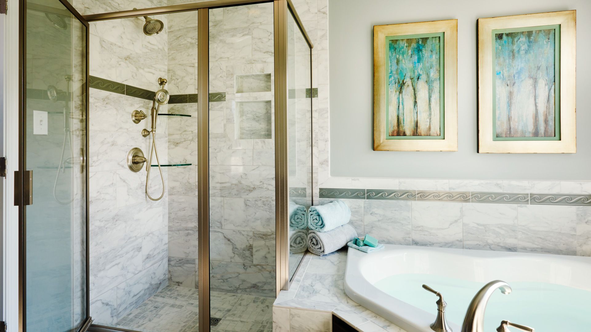Owner's bath with separate shower stall and corner soaking tub