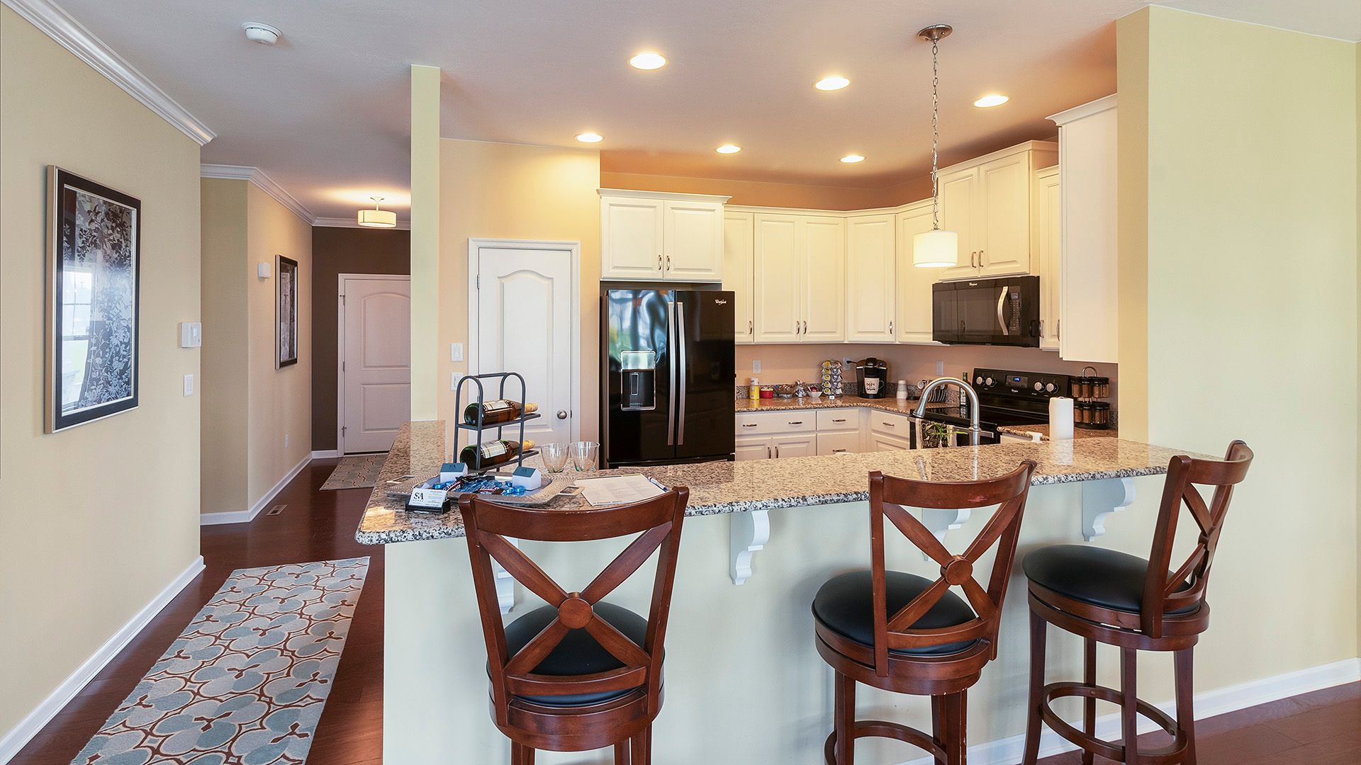 Bar overhang from kitchen into breakfast nook in the Crestmont floorplan by S&A Homes