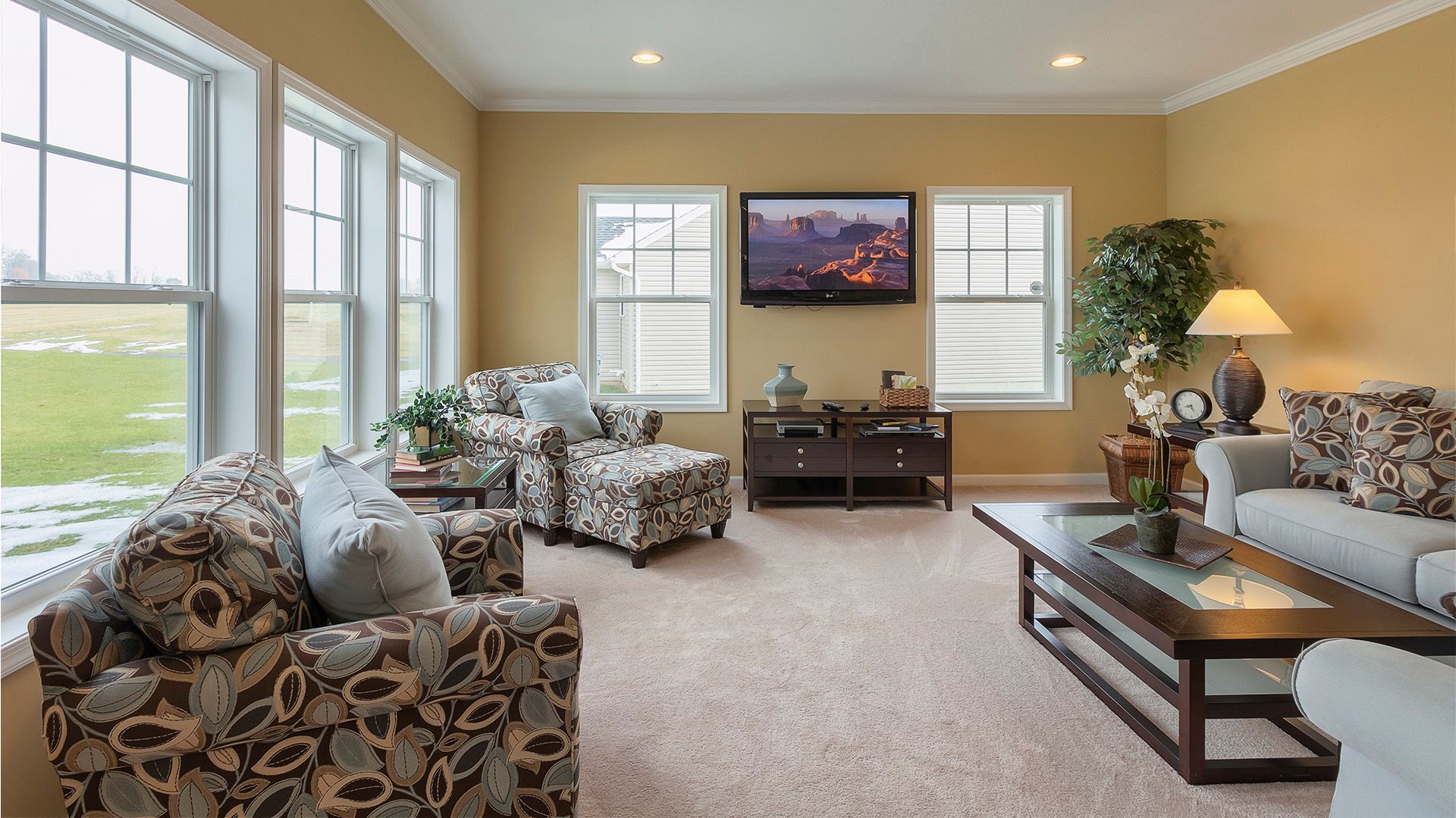 Furnished family room with flat screen TV, Crestmont plan