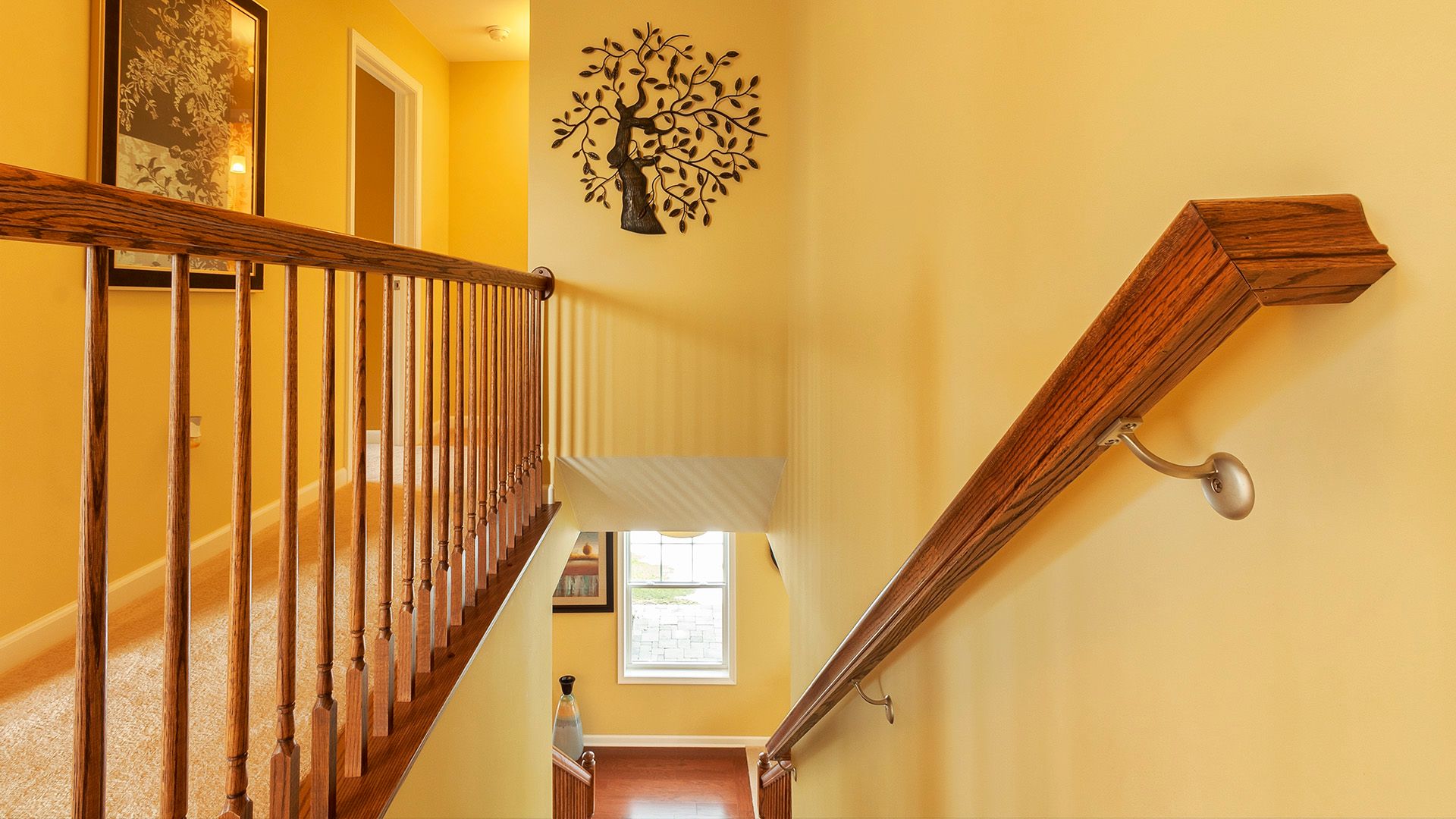 View from top of stairs looking down to main level, Crestmont floorplan