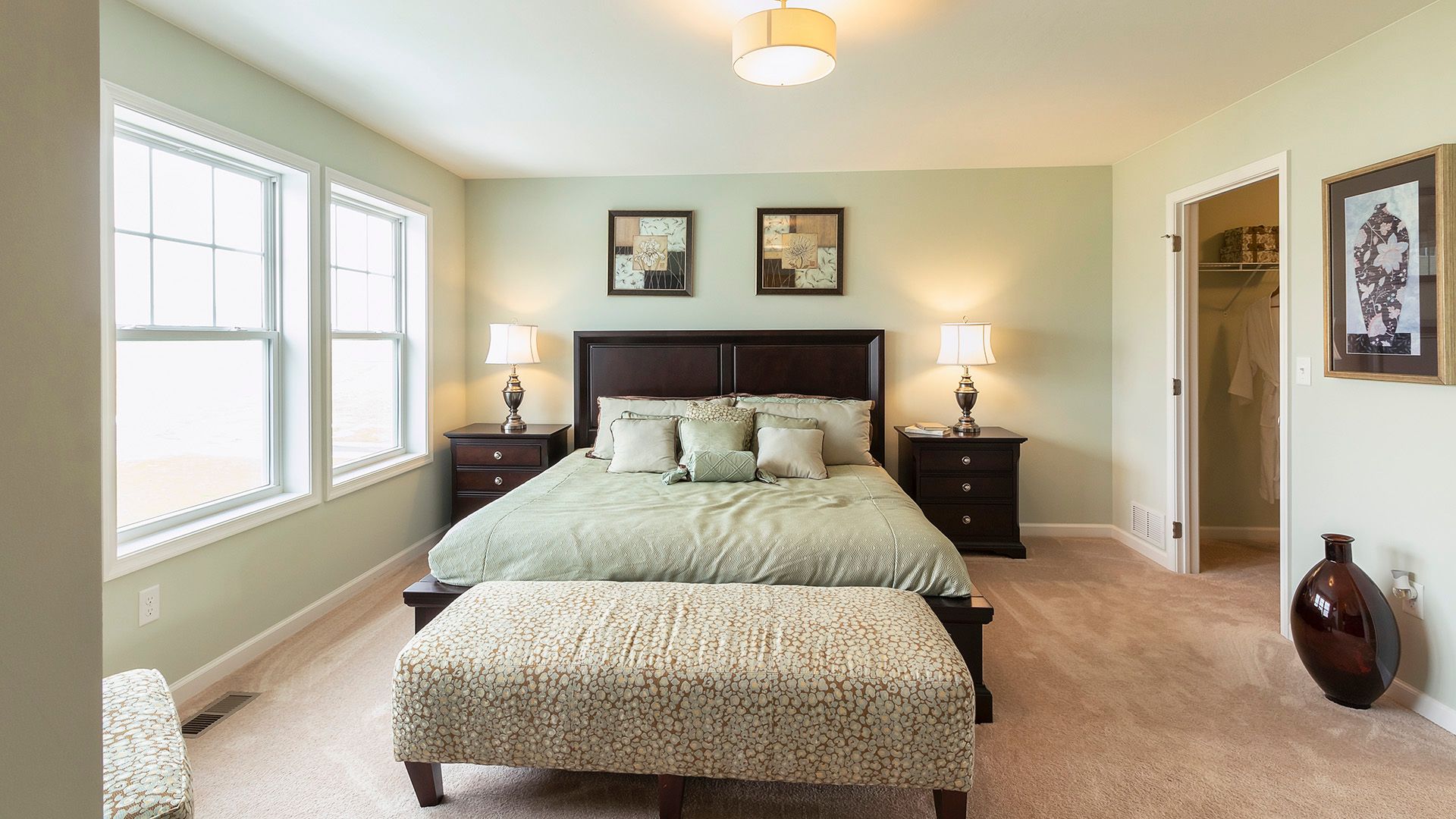 Furnished owners bedroom in Crestmont floorplan by S&AHomes