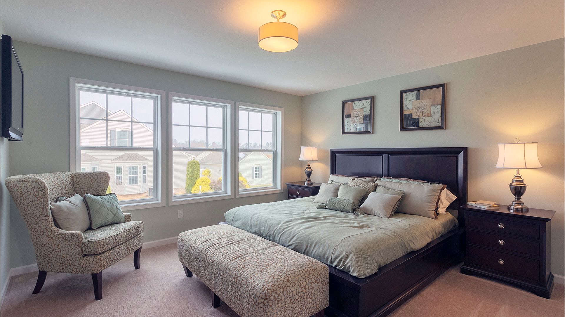 Furnished owners bedroom in Crestmont floorplan by S&AHomes