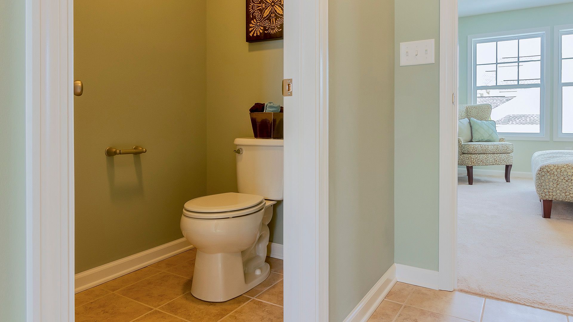 Enclosed water closet in the Crestmont floorplan owners bath