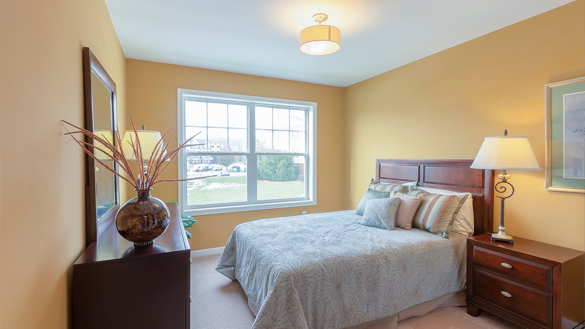 Furnished guest room, bedroom four in the Crestmont floorplan by S&A Homes