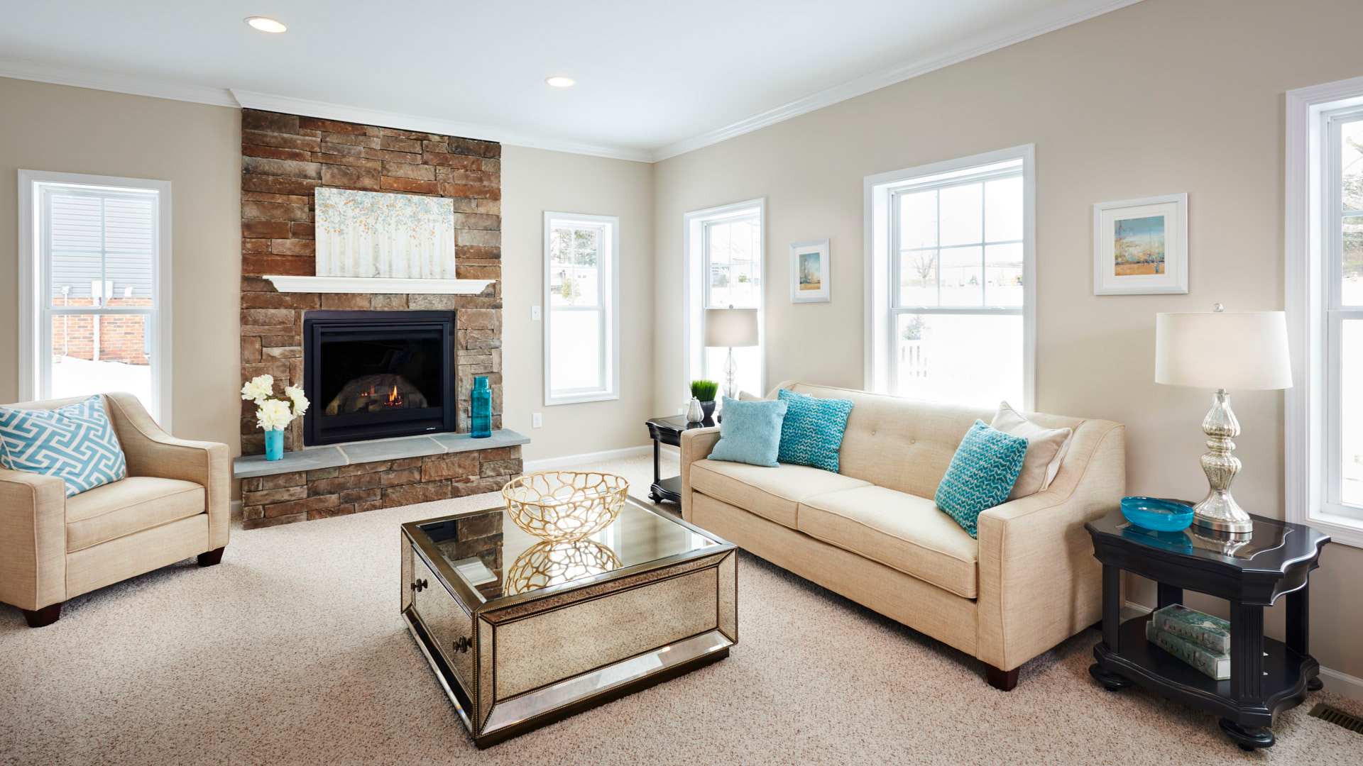 Furnished family room - gas fireplace with stone surround and raised hearth