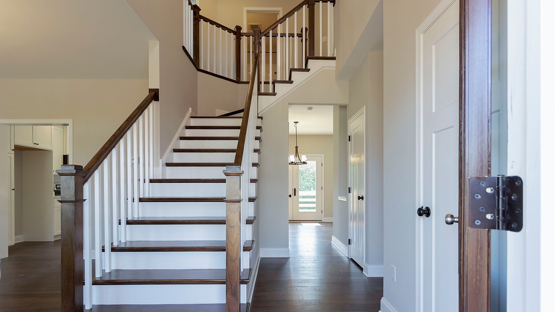 Foyer area leading into the stairs and hallway