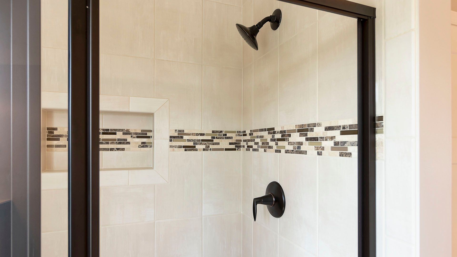 Owner's bathroom tiled shower