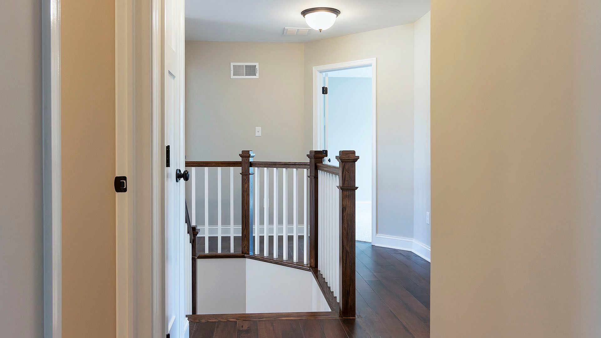 Second floor hallway with hardwood