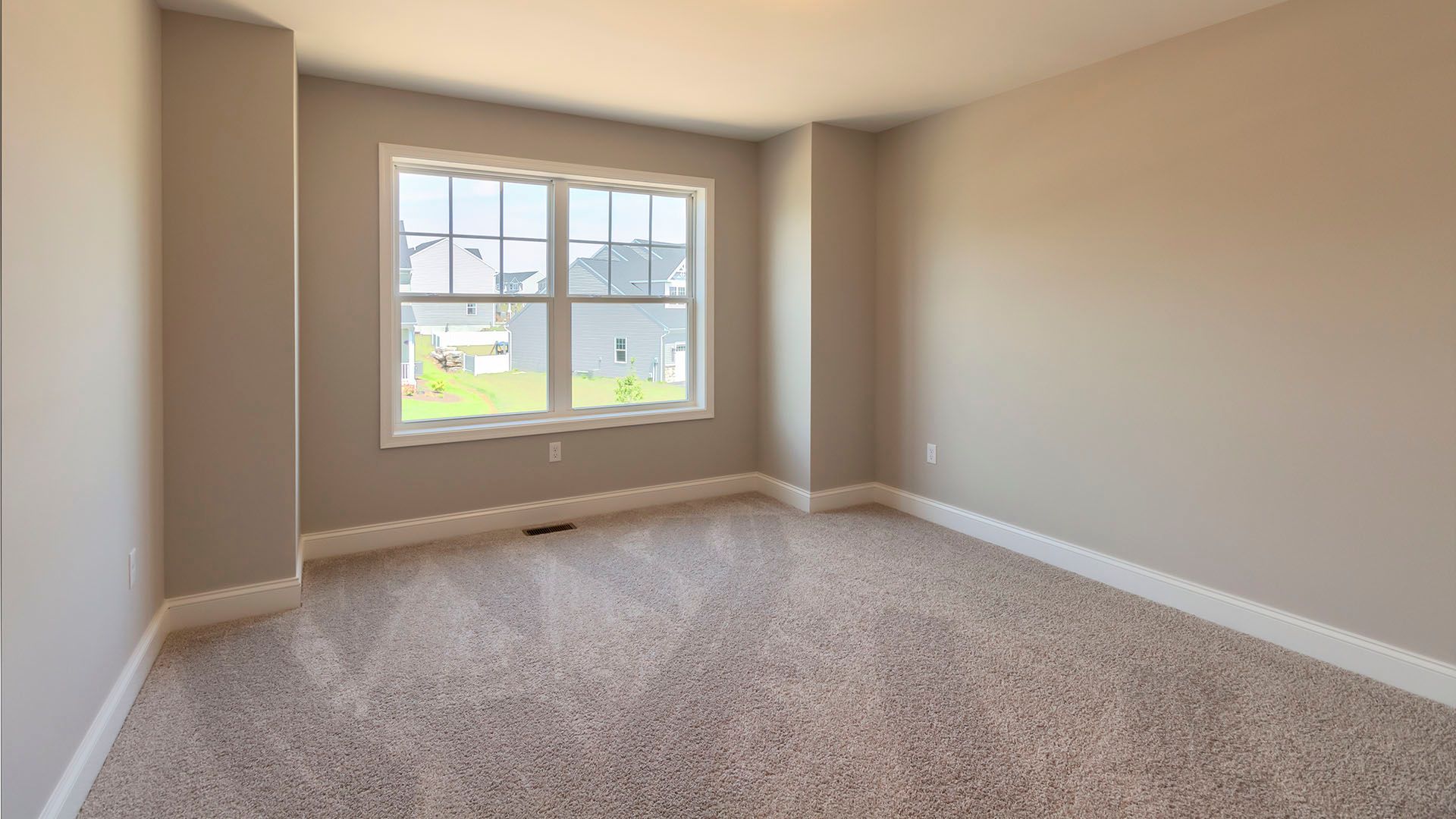 Bedroom #2 with large window, carpet